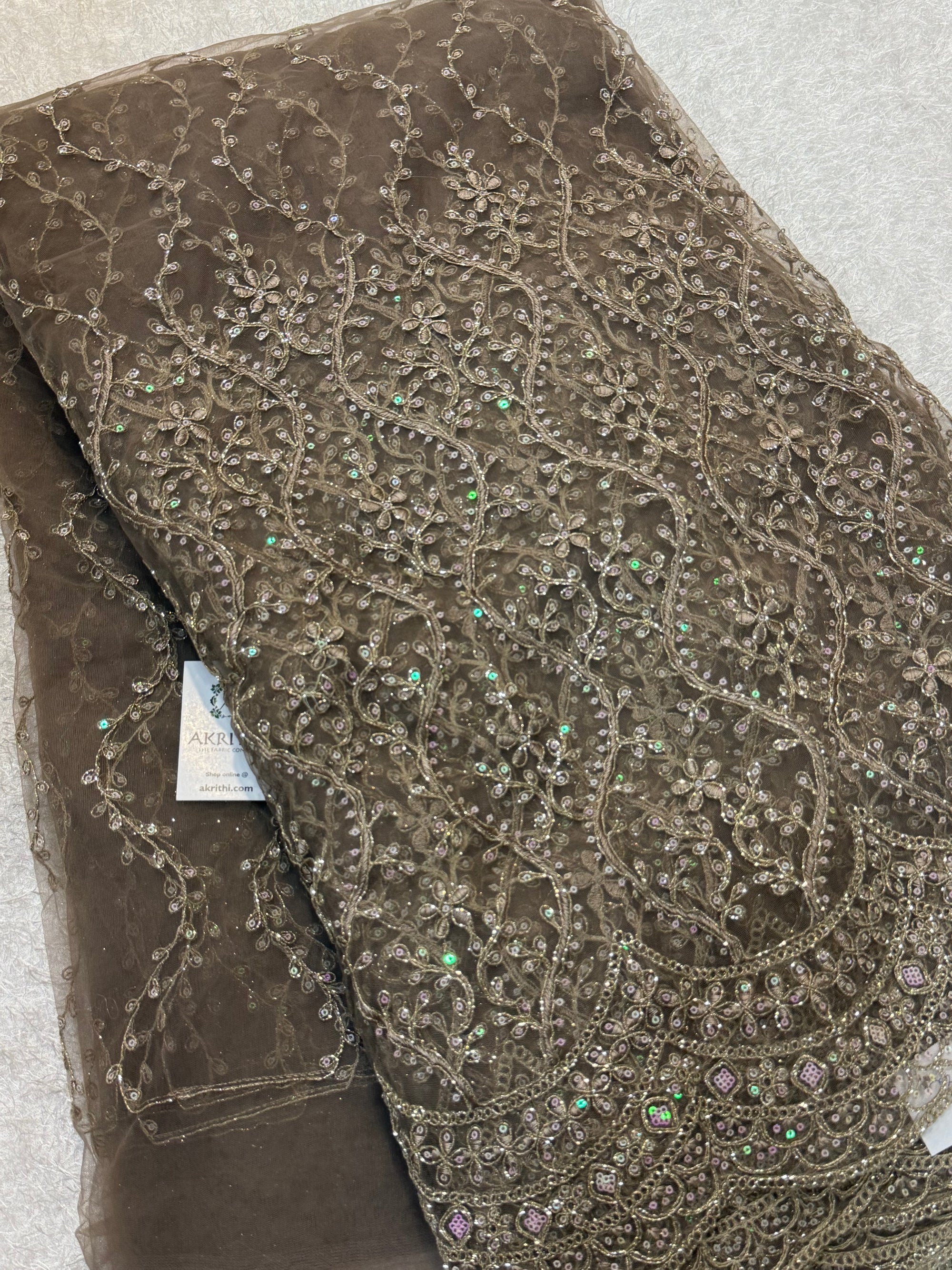 Embroidered net fabric