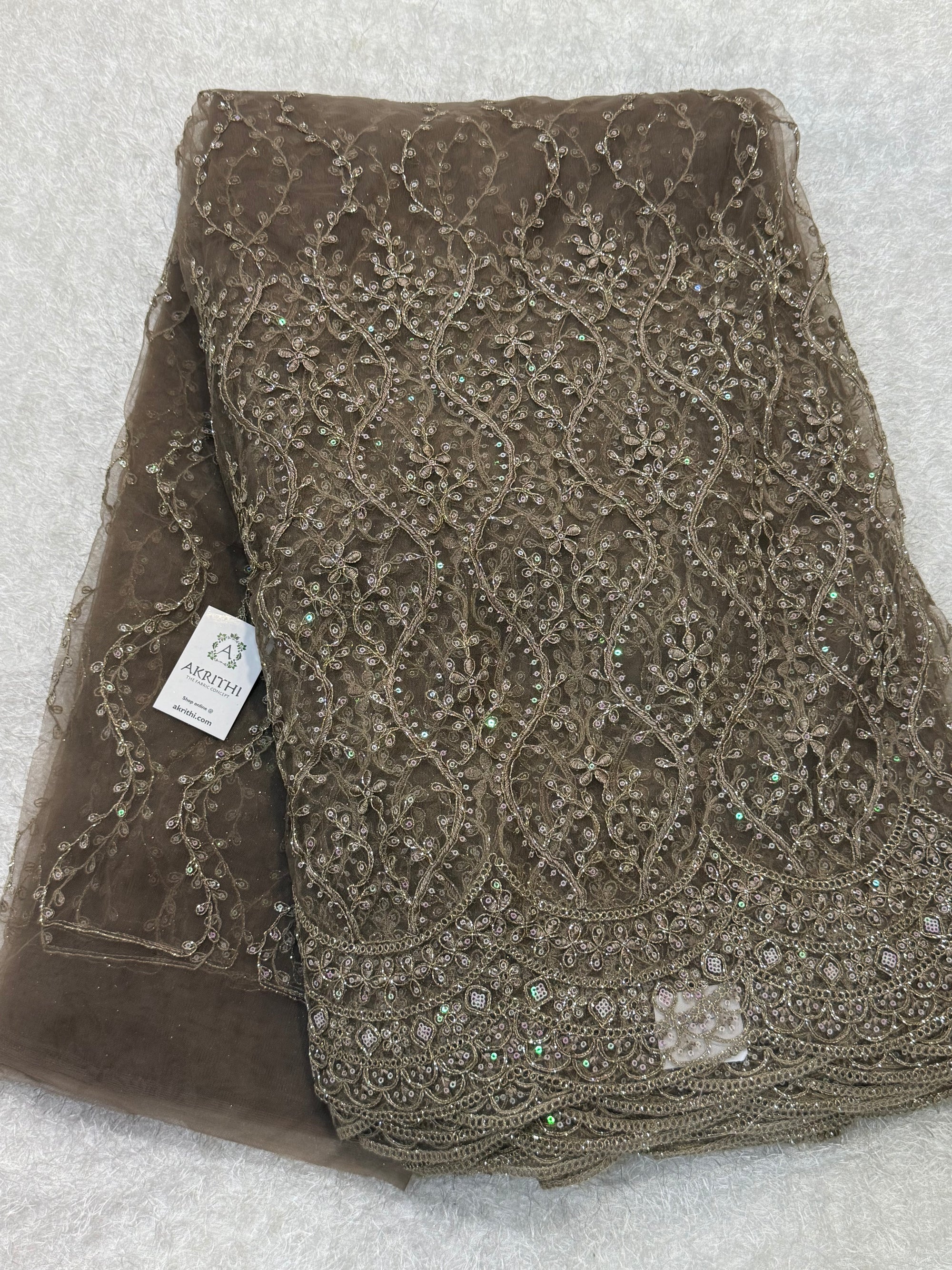 Embroidered net fabric