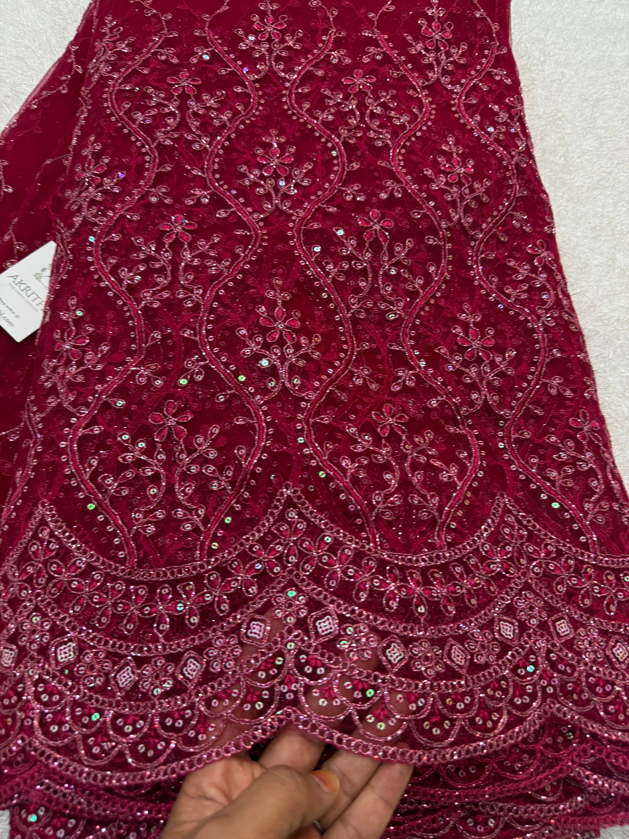 Embroidered net fabric