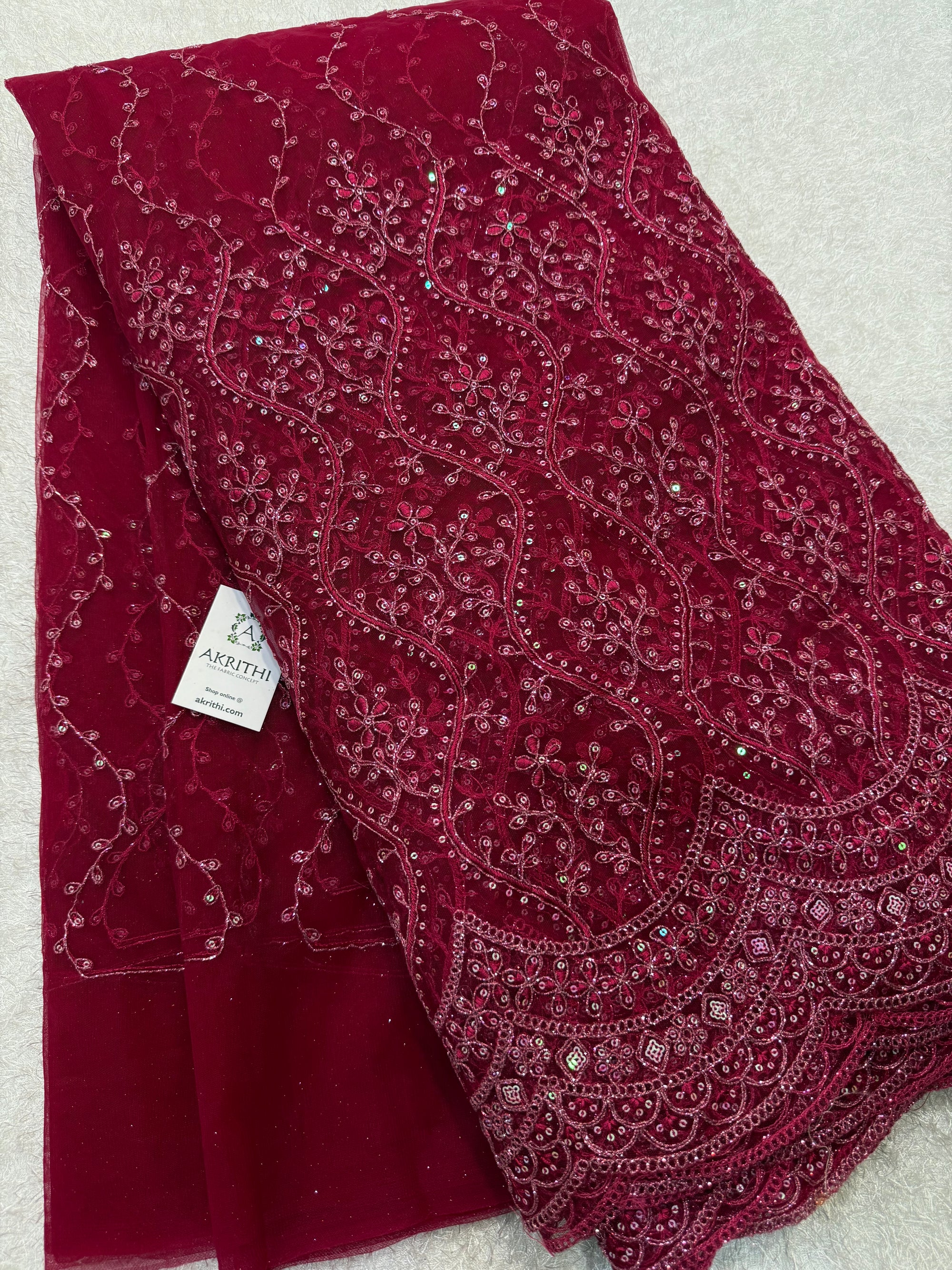 Embroidered net fabric
