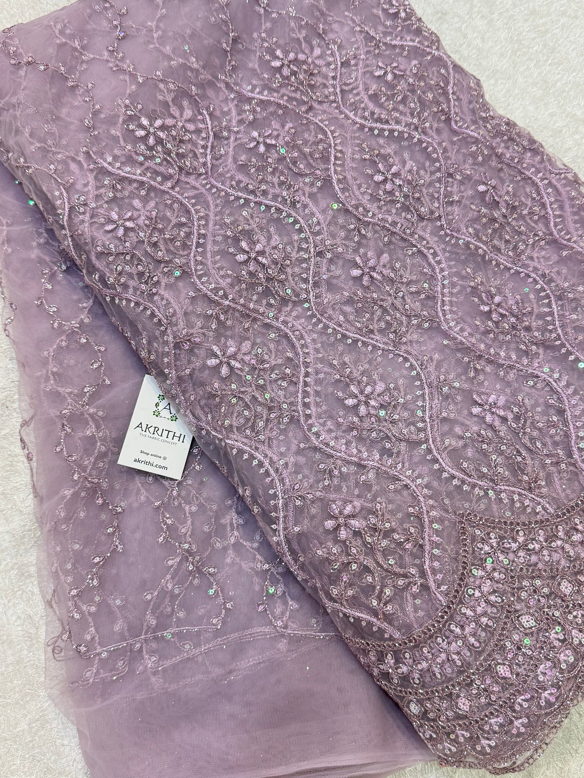 Embroidered net fabric