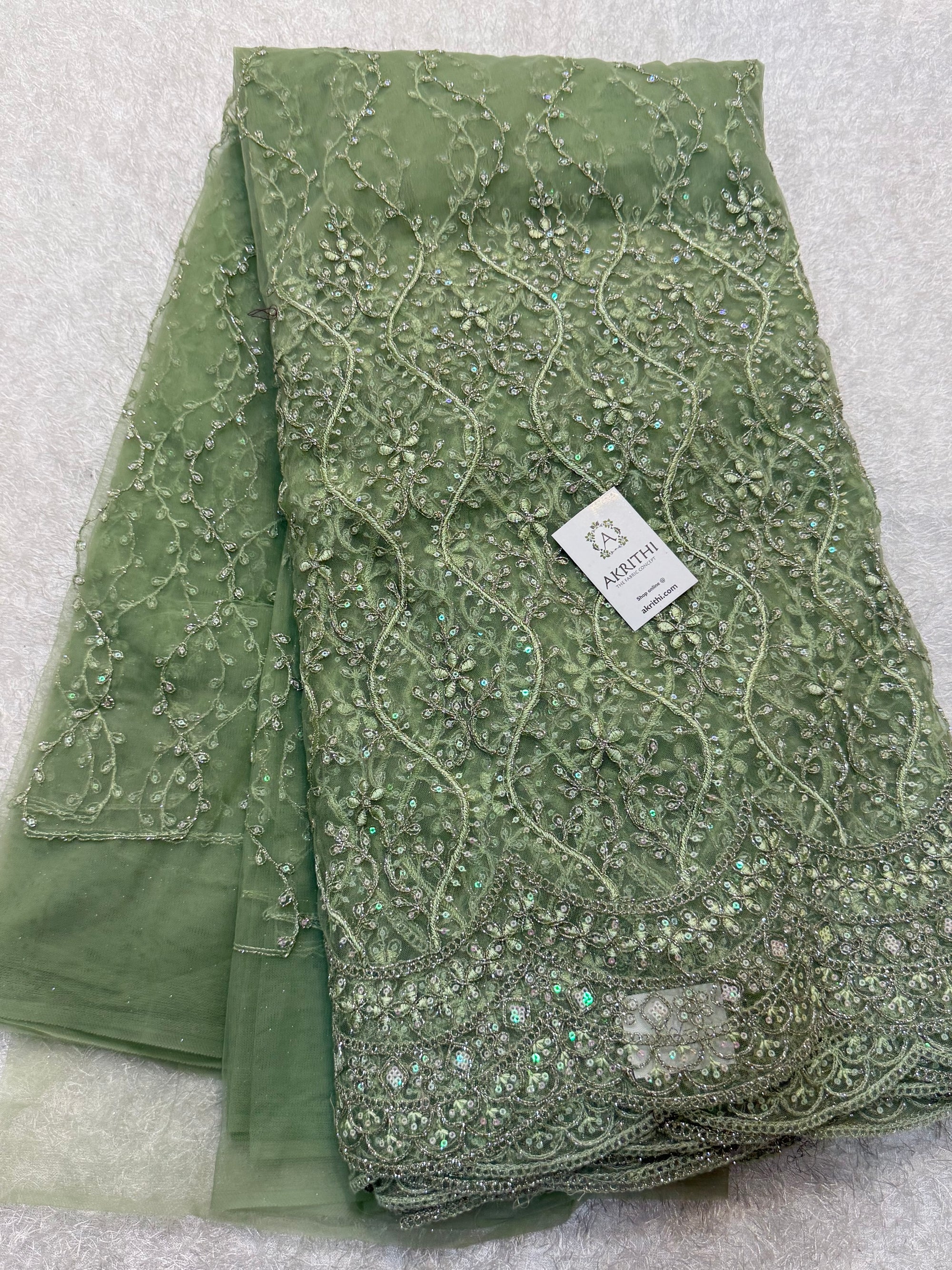 Embroidered net fabric