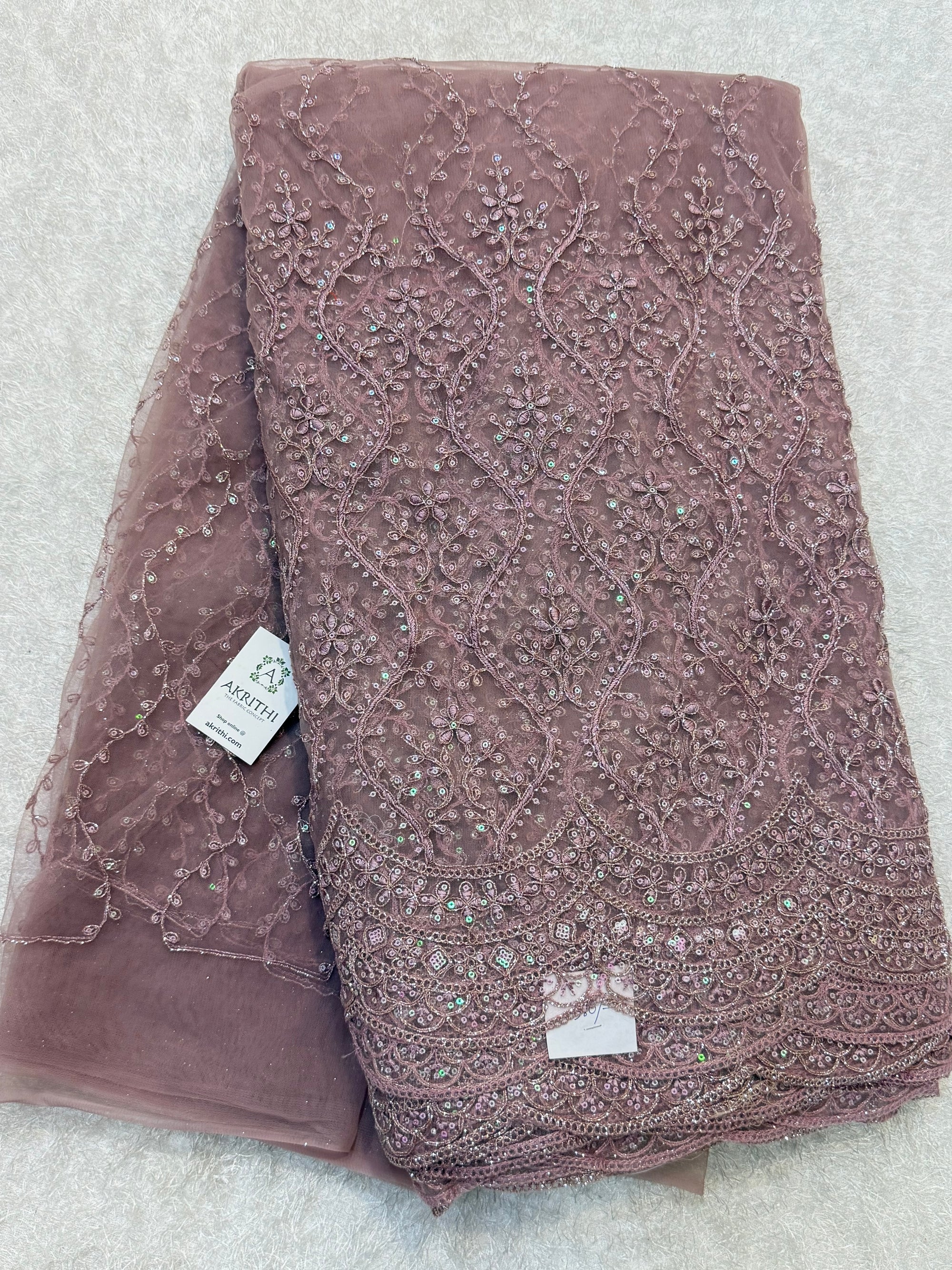 Embroidered net fabric