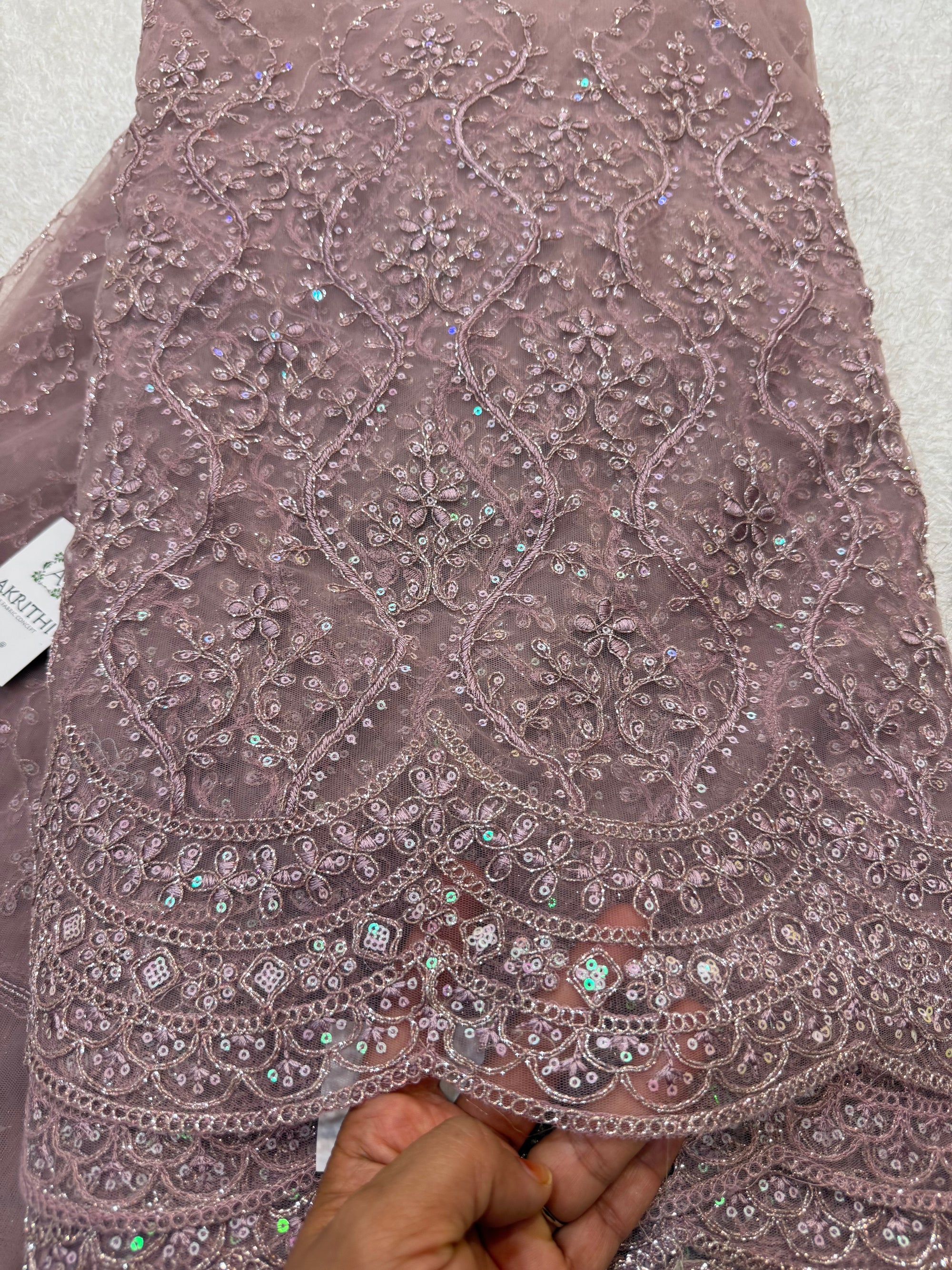 Embroidered net fabric