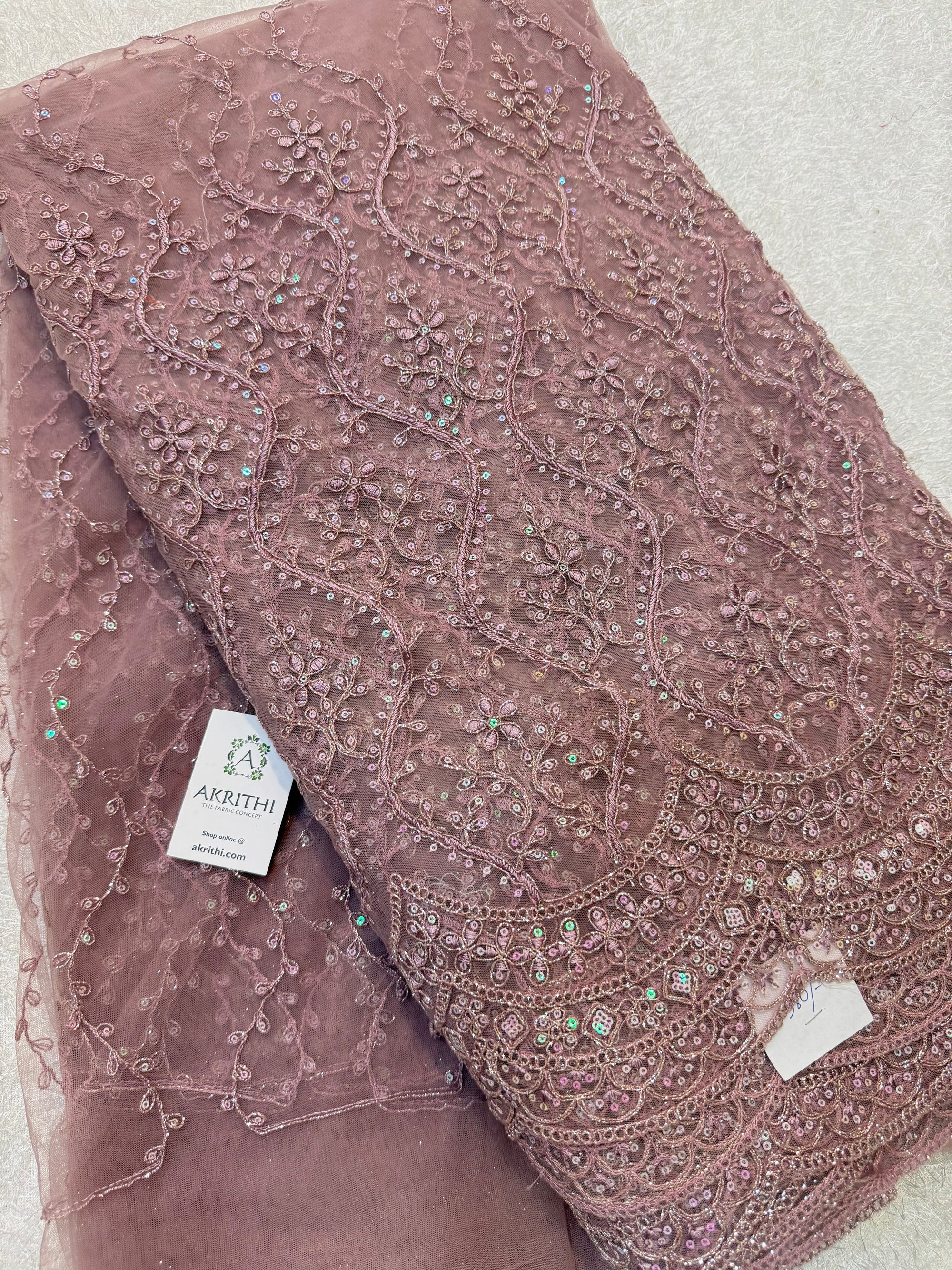 Embroidered net fabric