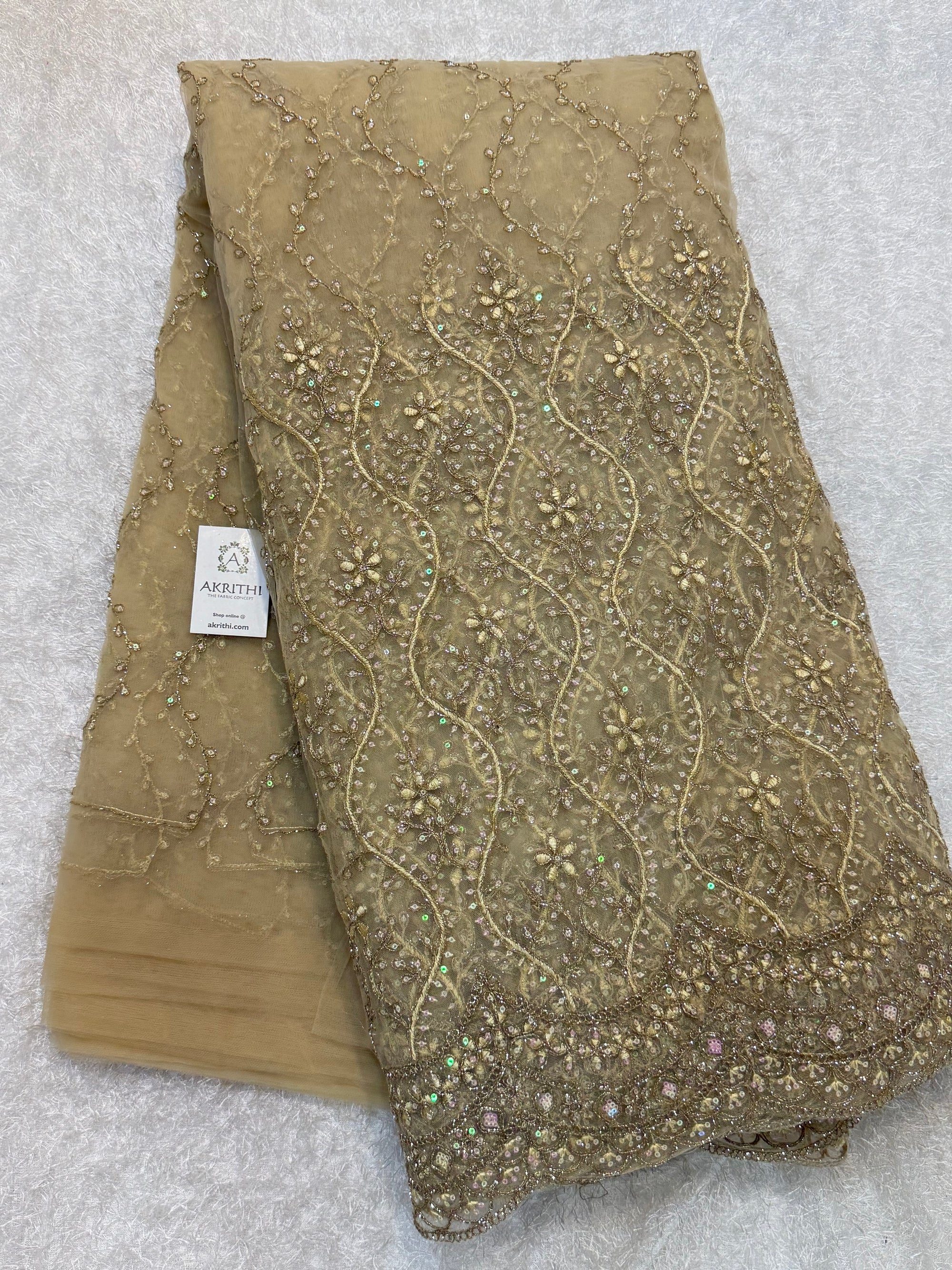 Embroidered net fabric