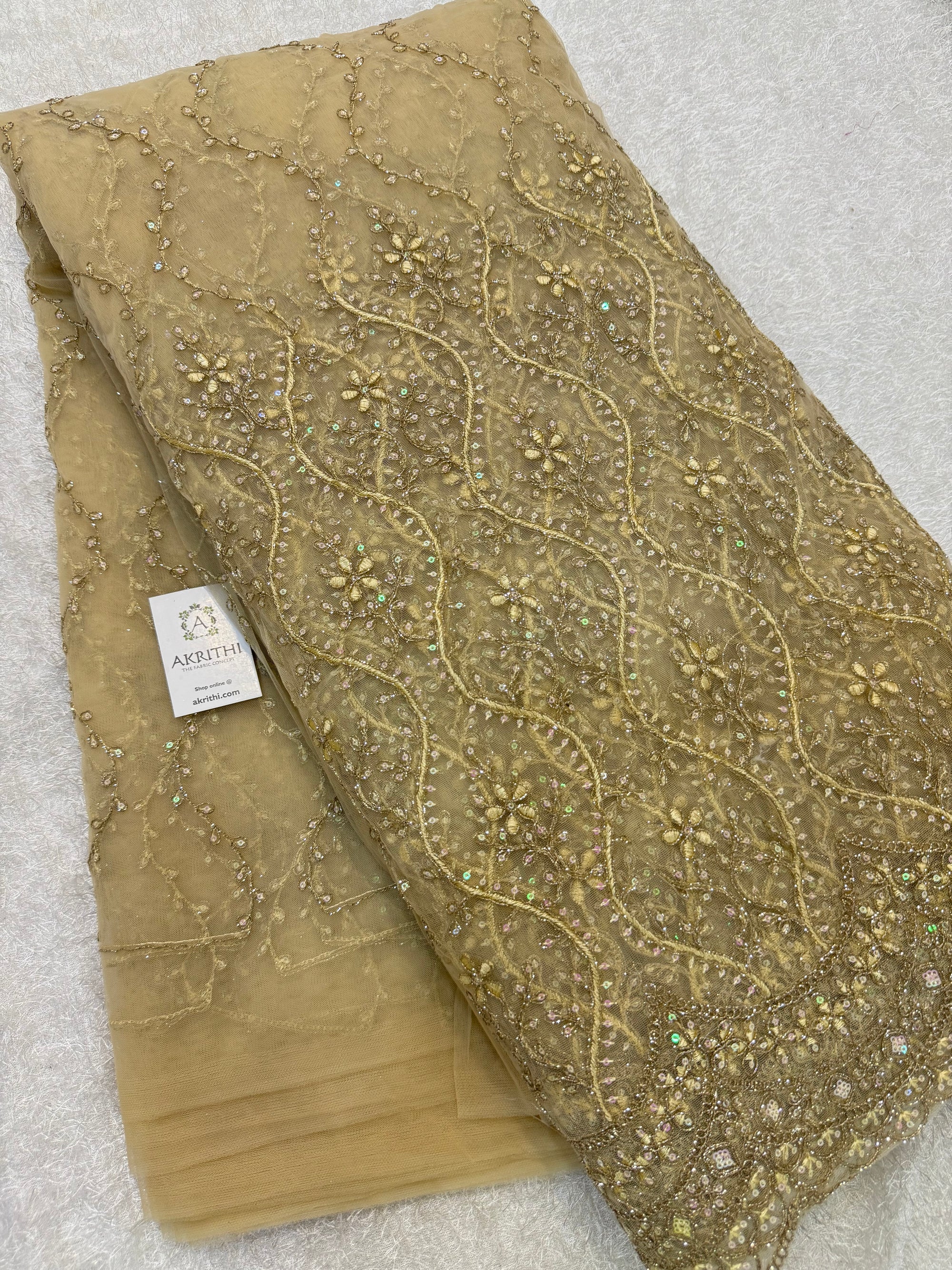 Embroidered net fabric