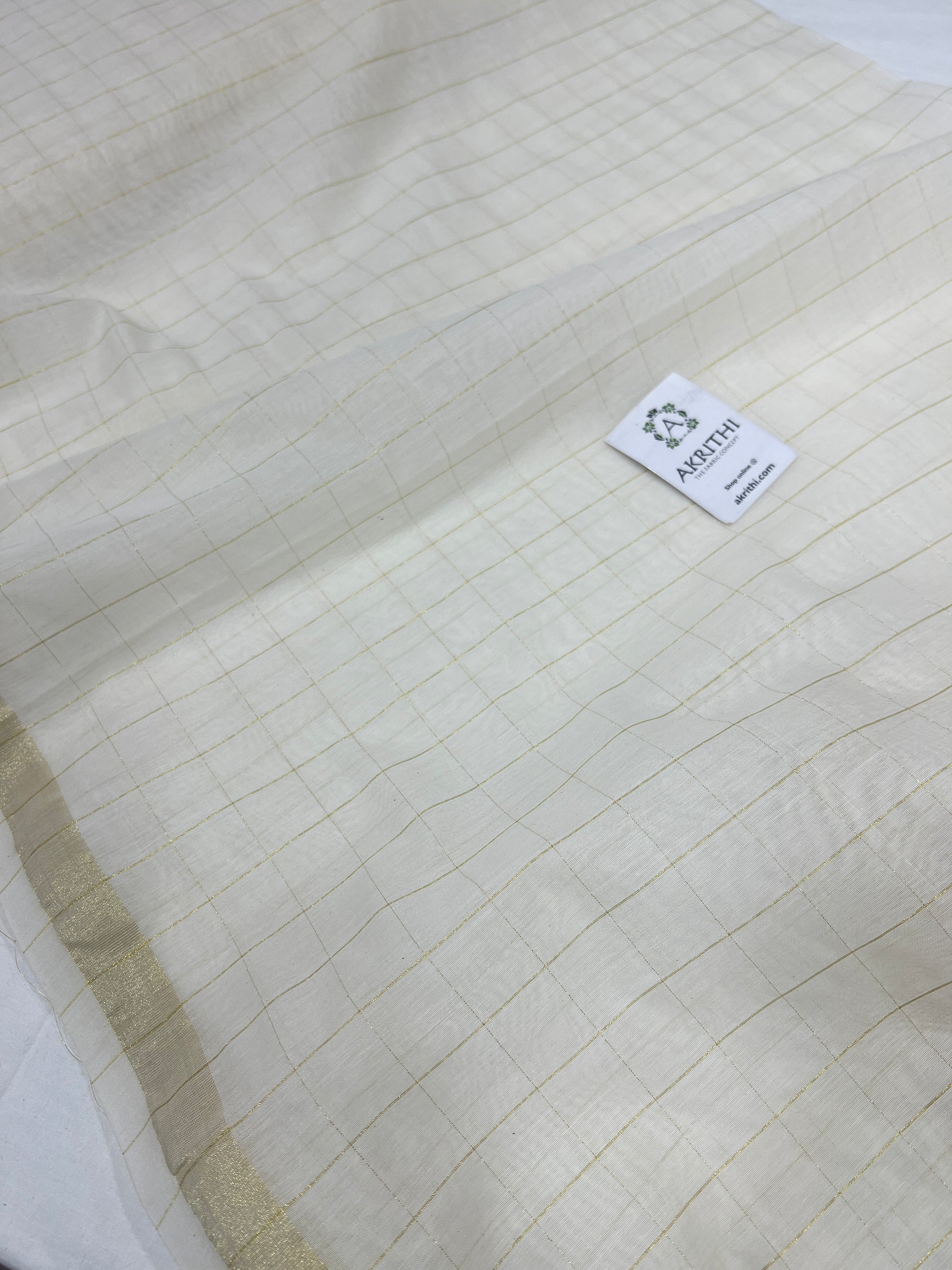 Dyeable chanderi with gold zari checks fabric