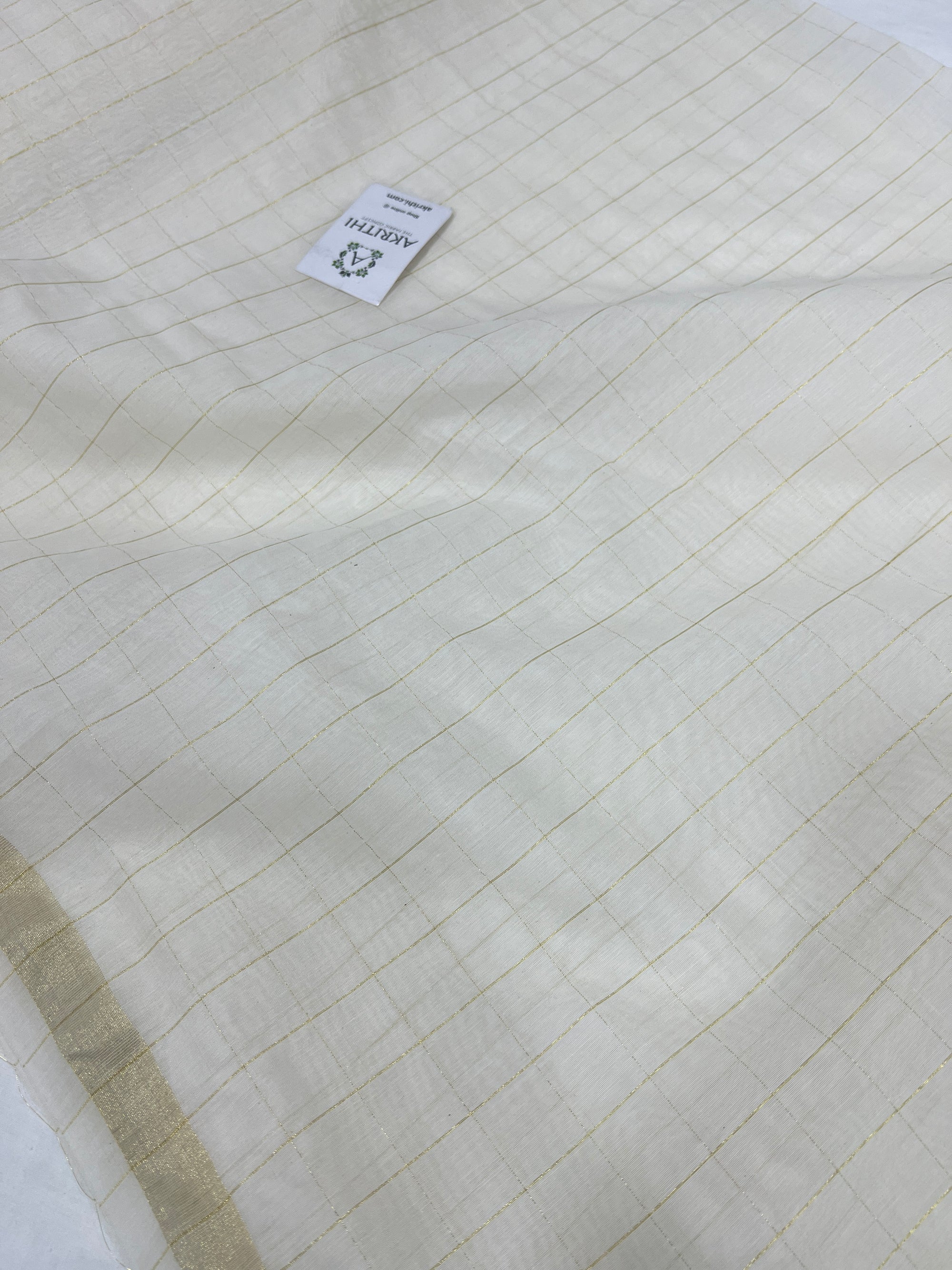 Dyeable chanderi with gold zari checks fabric