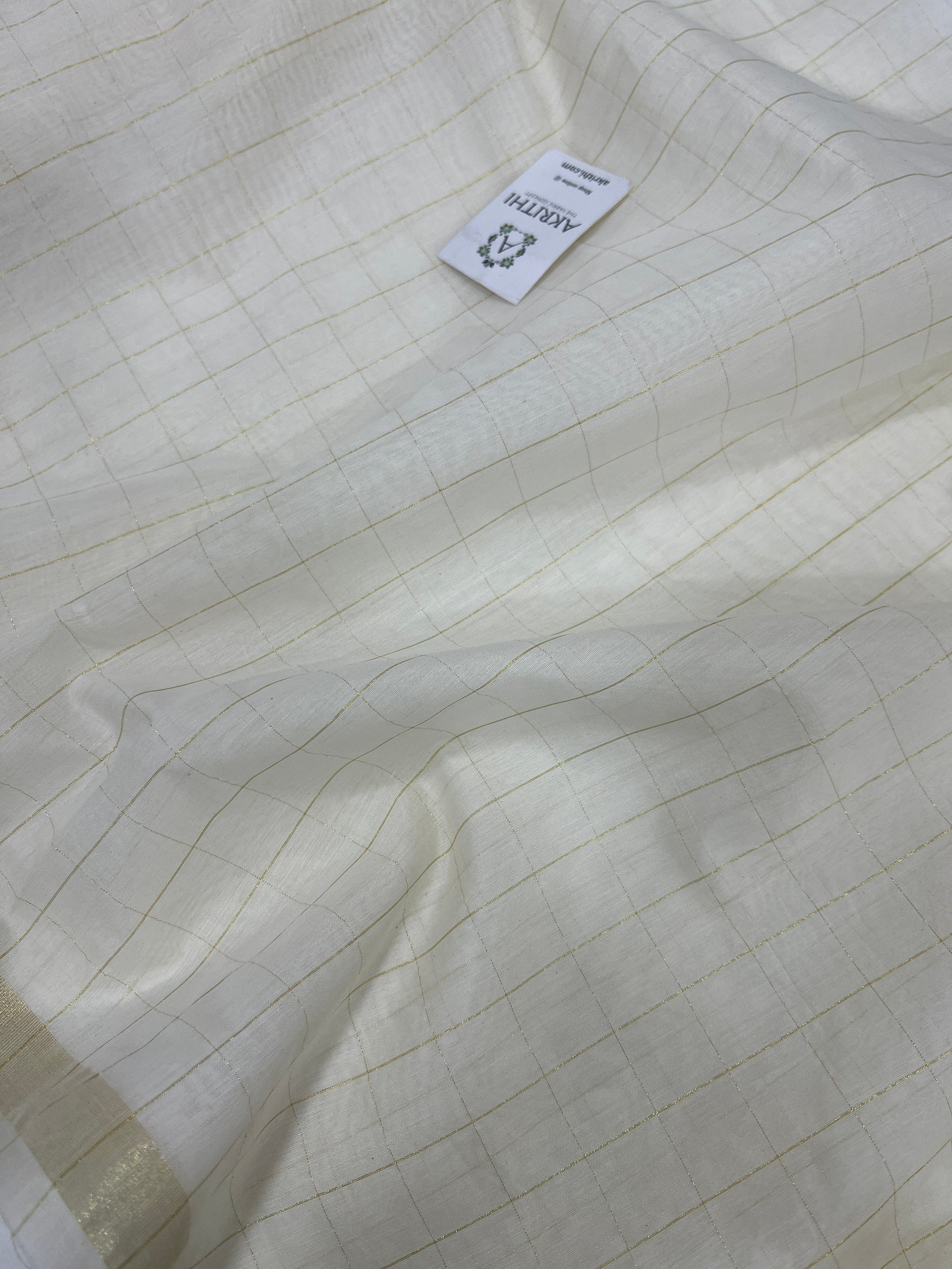 Dyeable chanderi with gold zari checks fabric