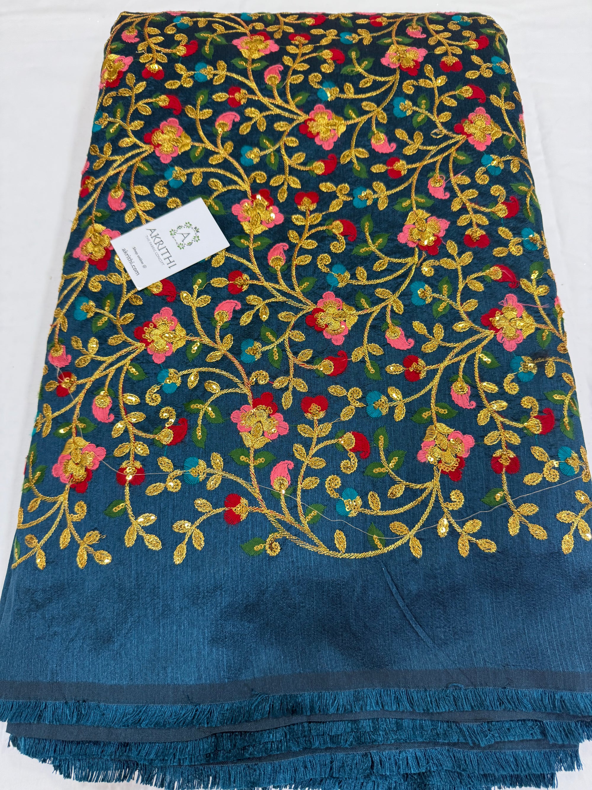 Embroidered silk fabric