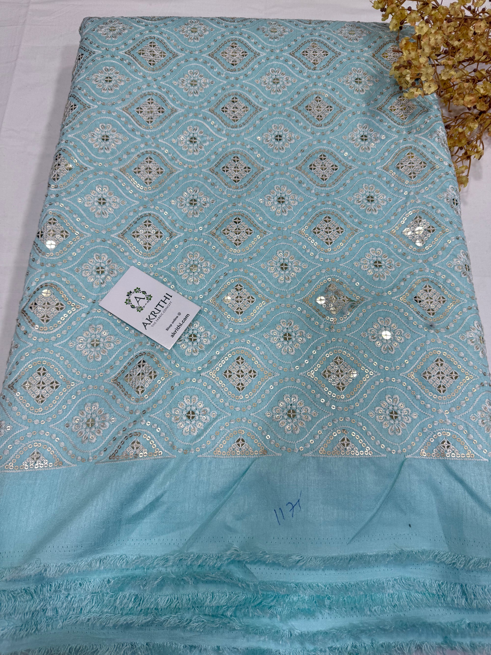 Embroidered Raw silk fabric