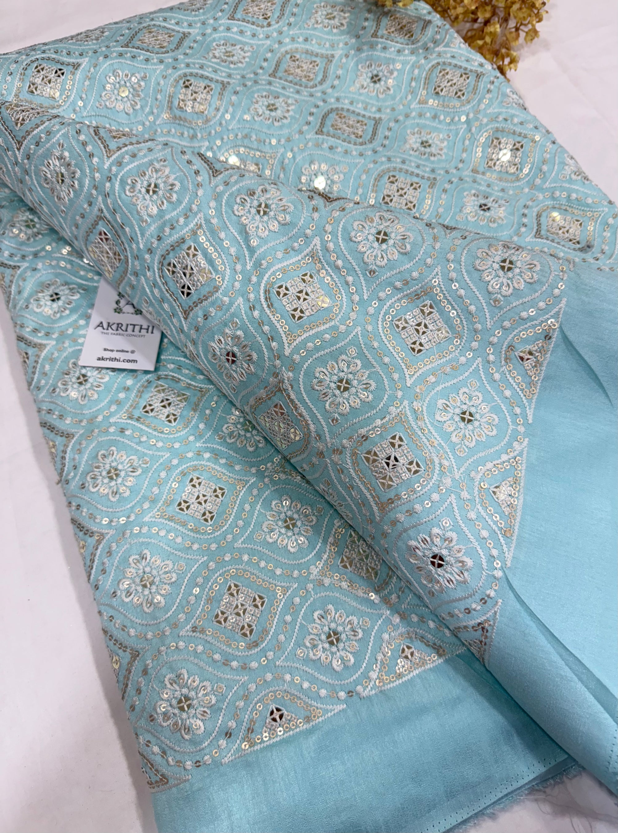 Embroidered Raw silk fabric