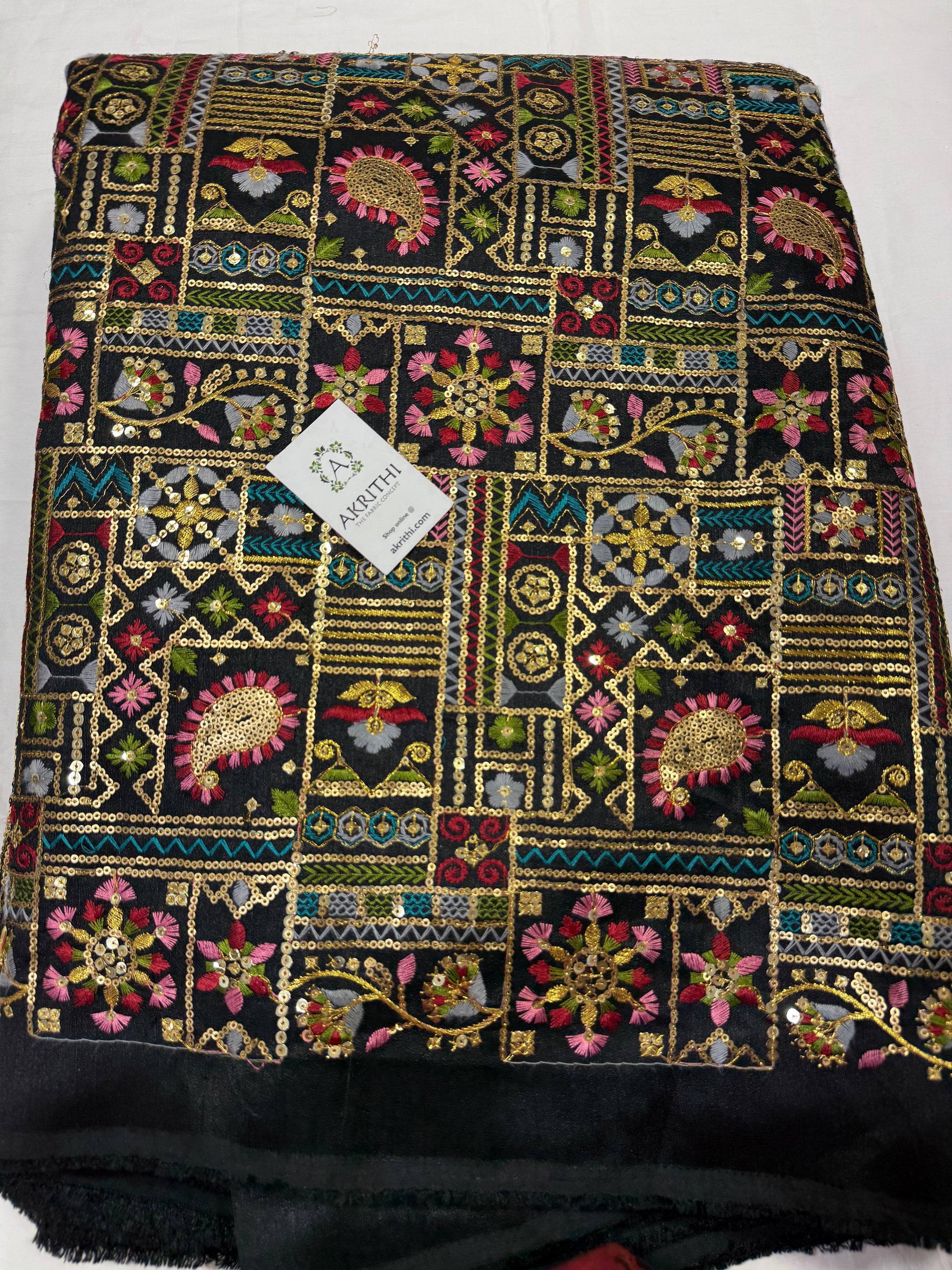 Embroidered raw silk fabric