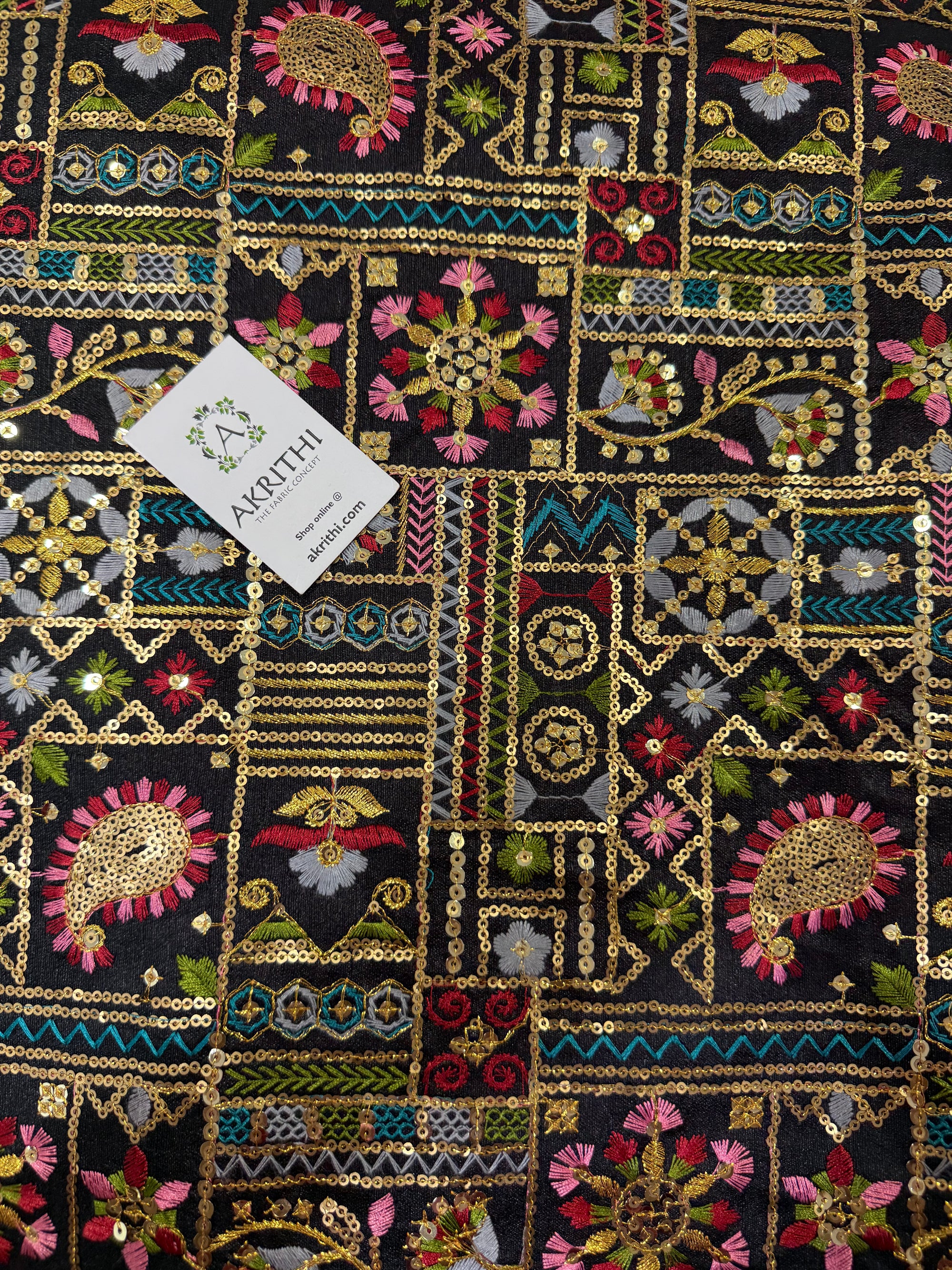 Embroidered raw silk fabric