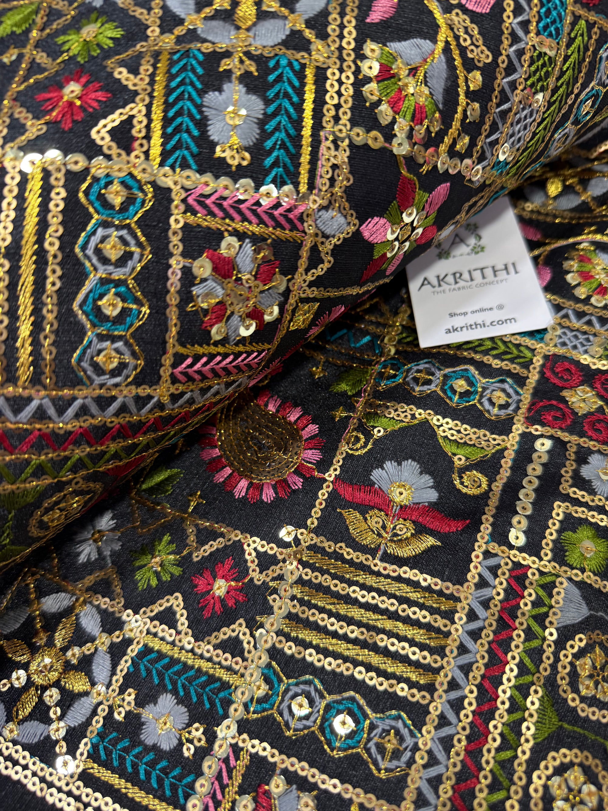 Embroidered raw silk fabric