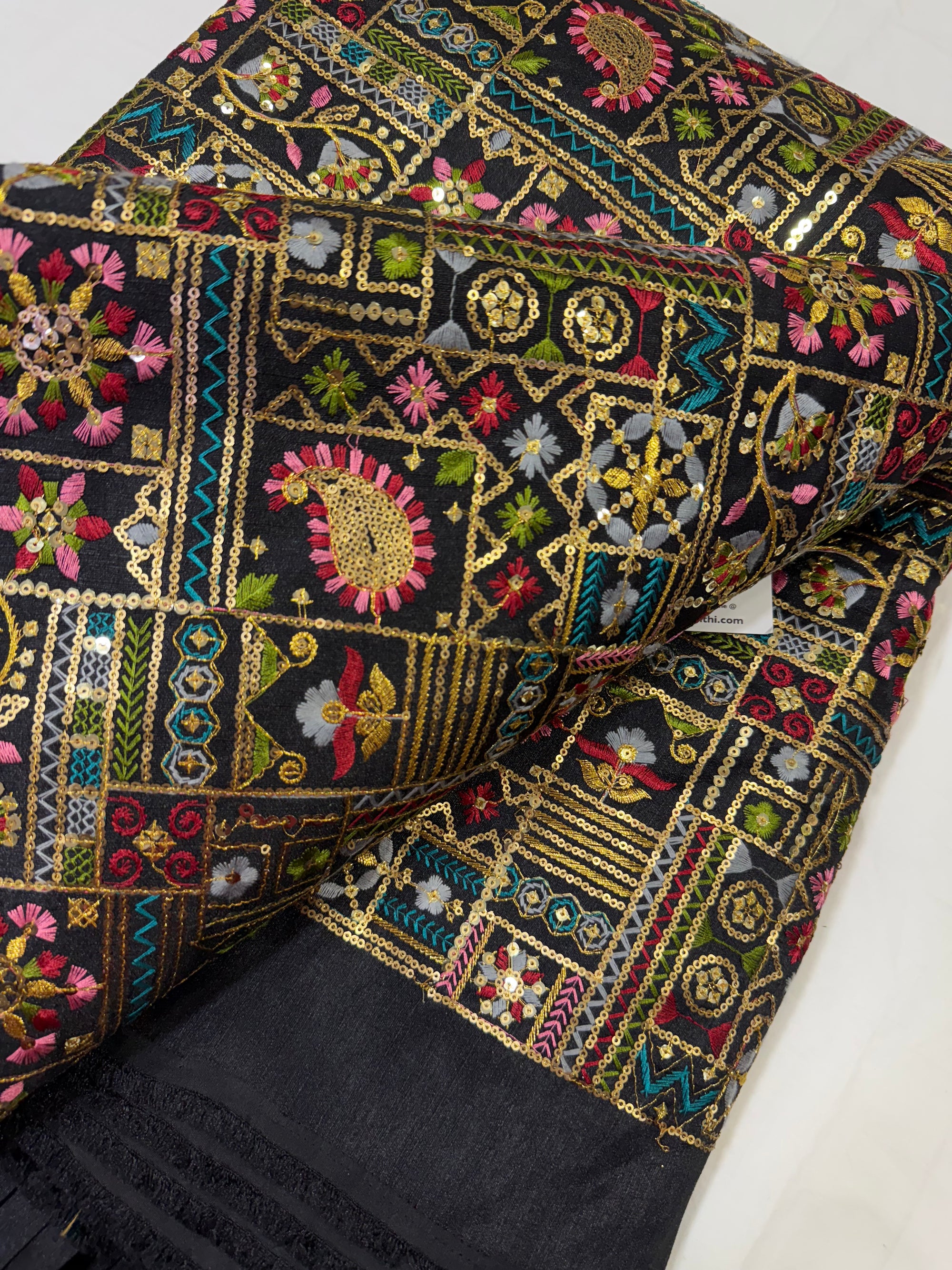 Embroidered raw silk fabric