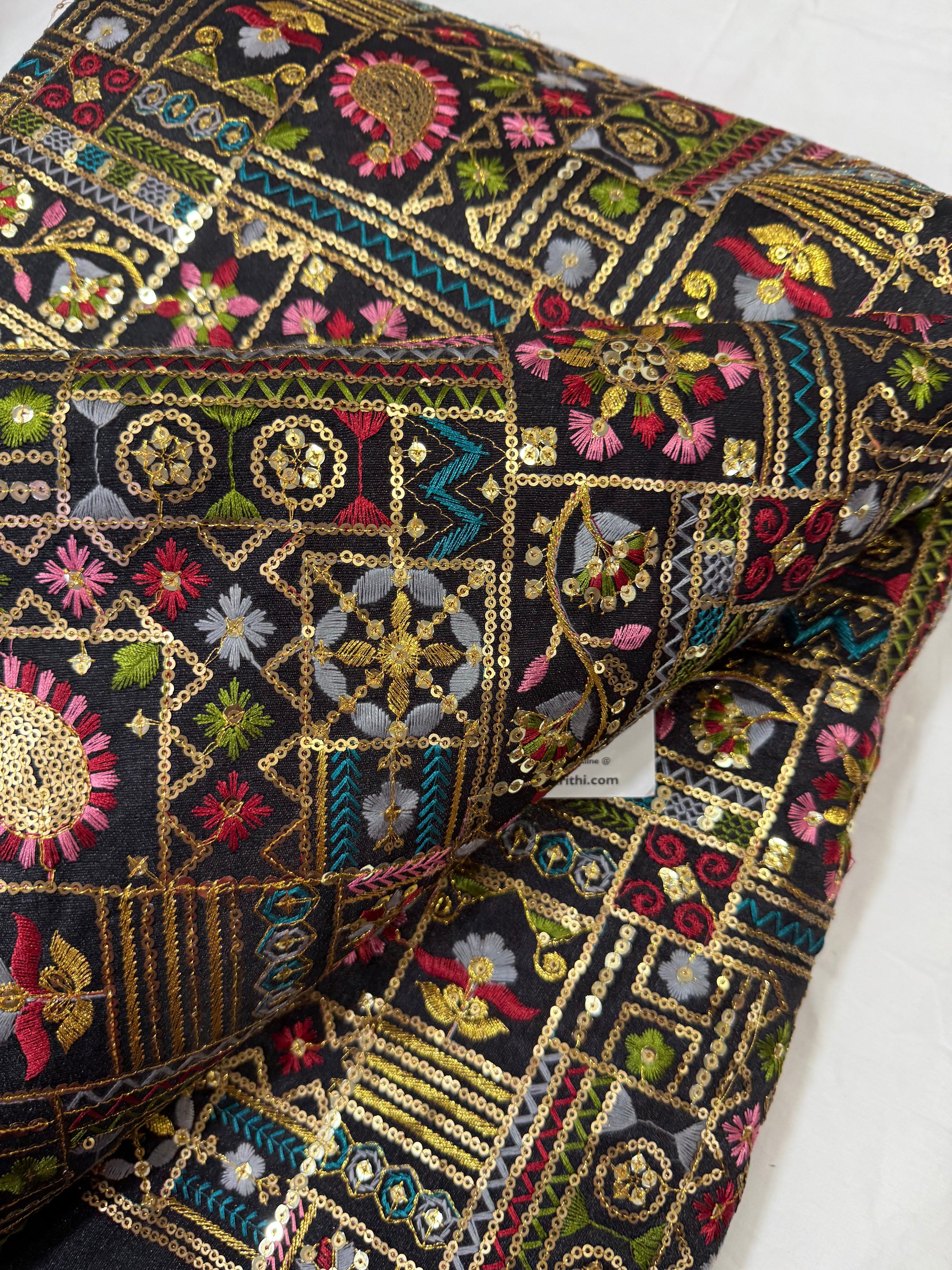 Embroidered raw silk fabric