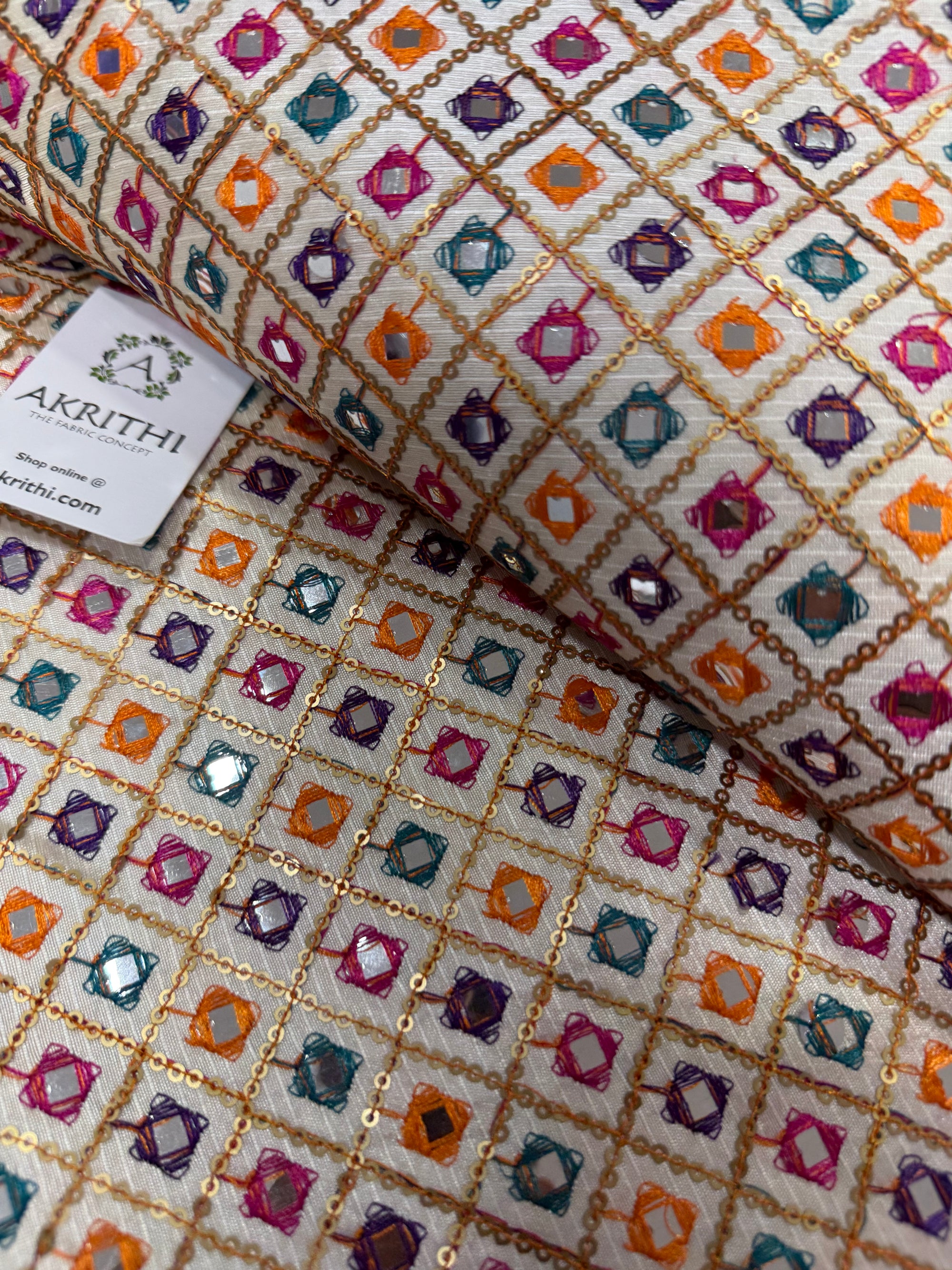 Embroidered raw silk fabric