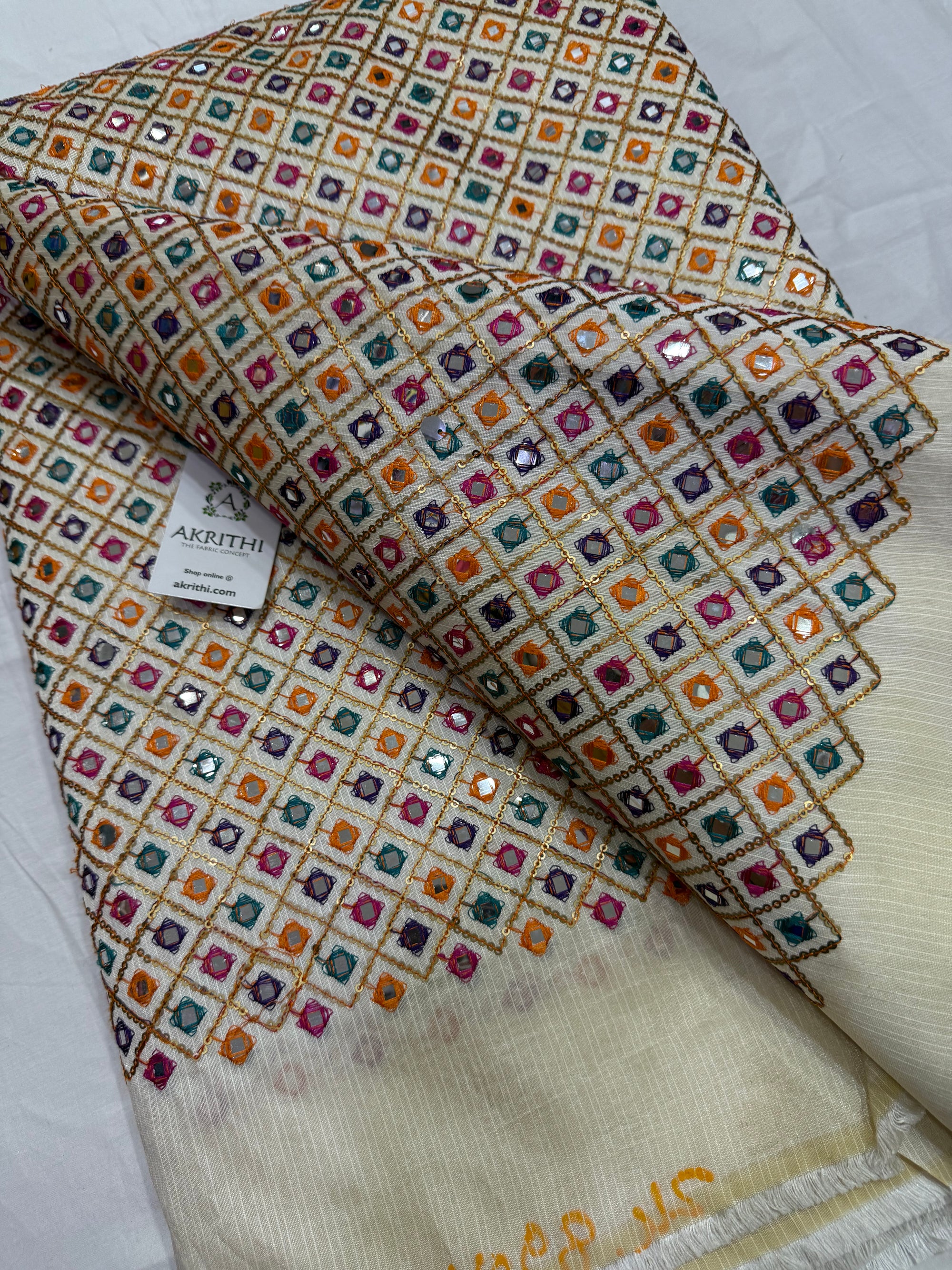 Embroidered raw silk fabric
