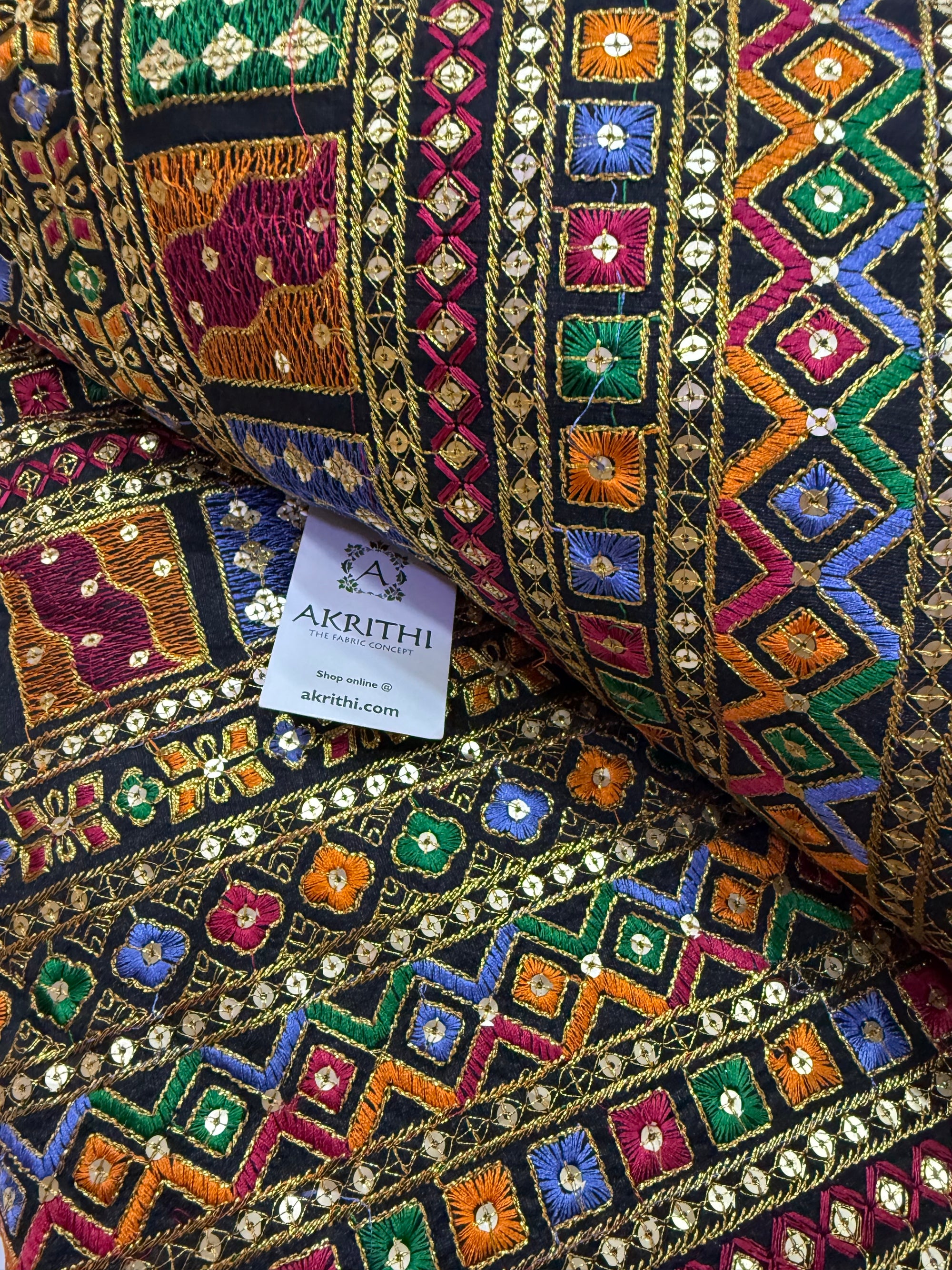 Embroidered raw silk fabric