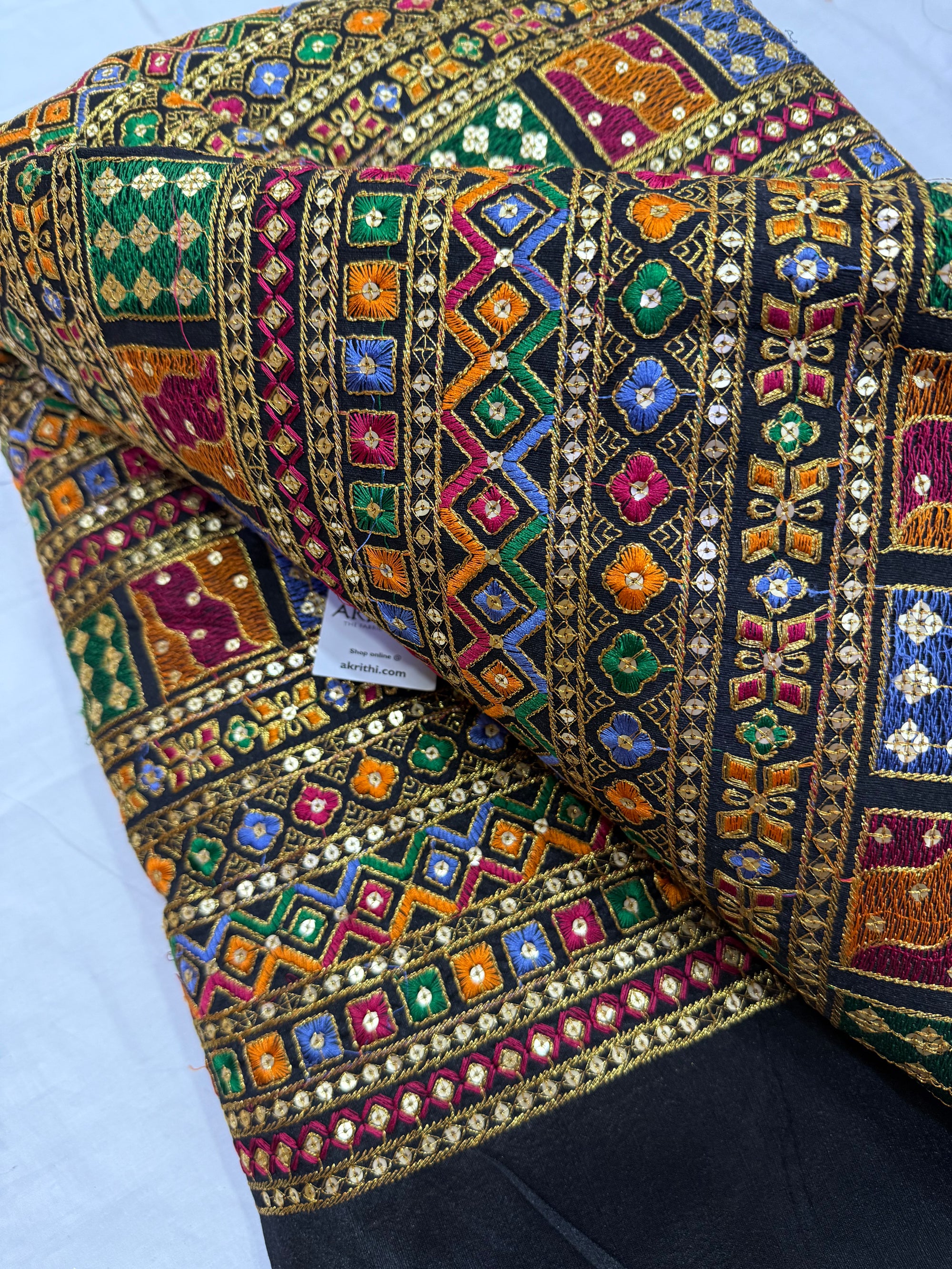 Embroidered raw silk fabric