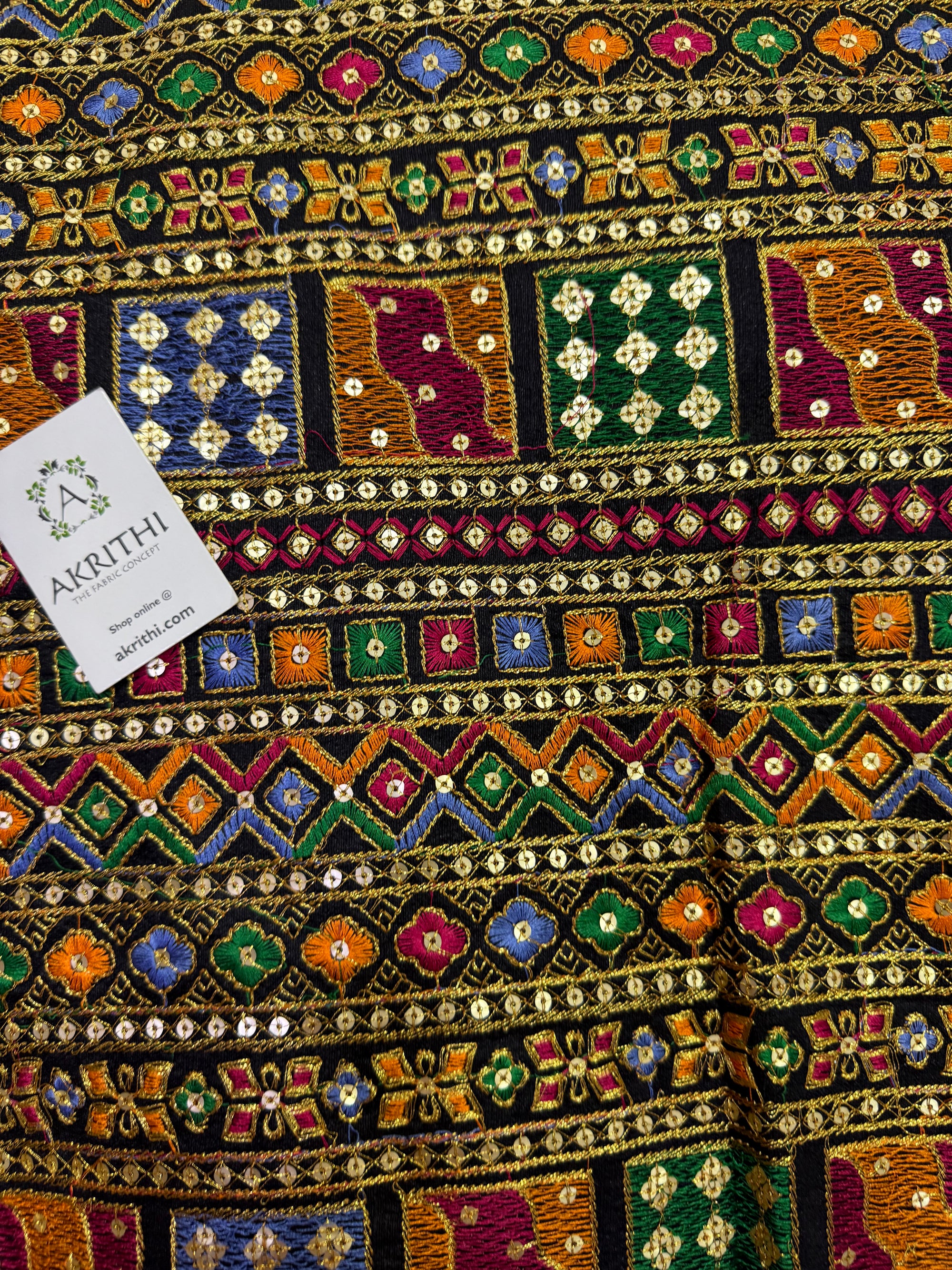 Embroidered raw silk fabric