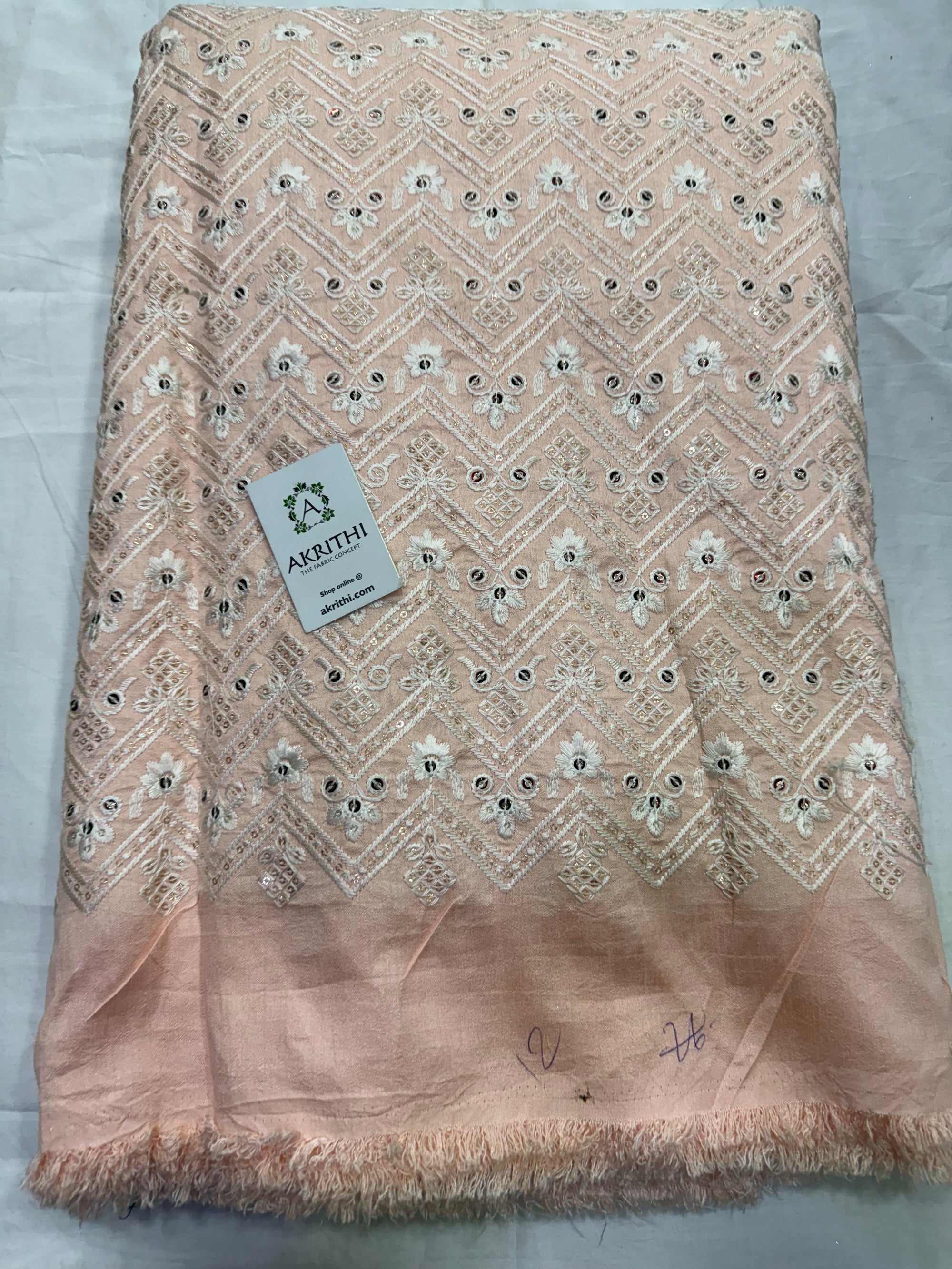 Embroidered raw silk fabric