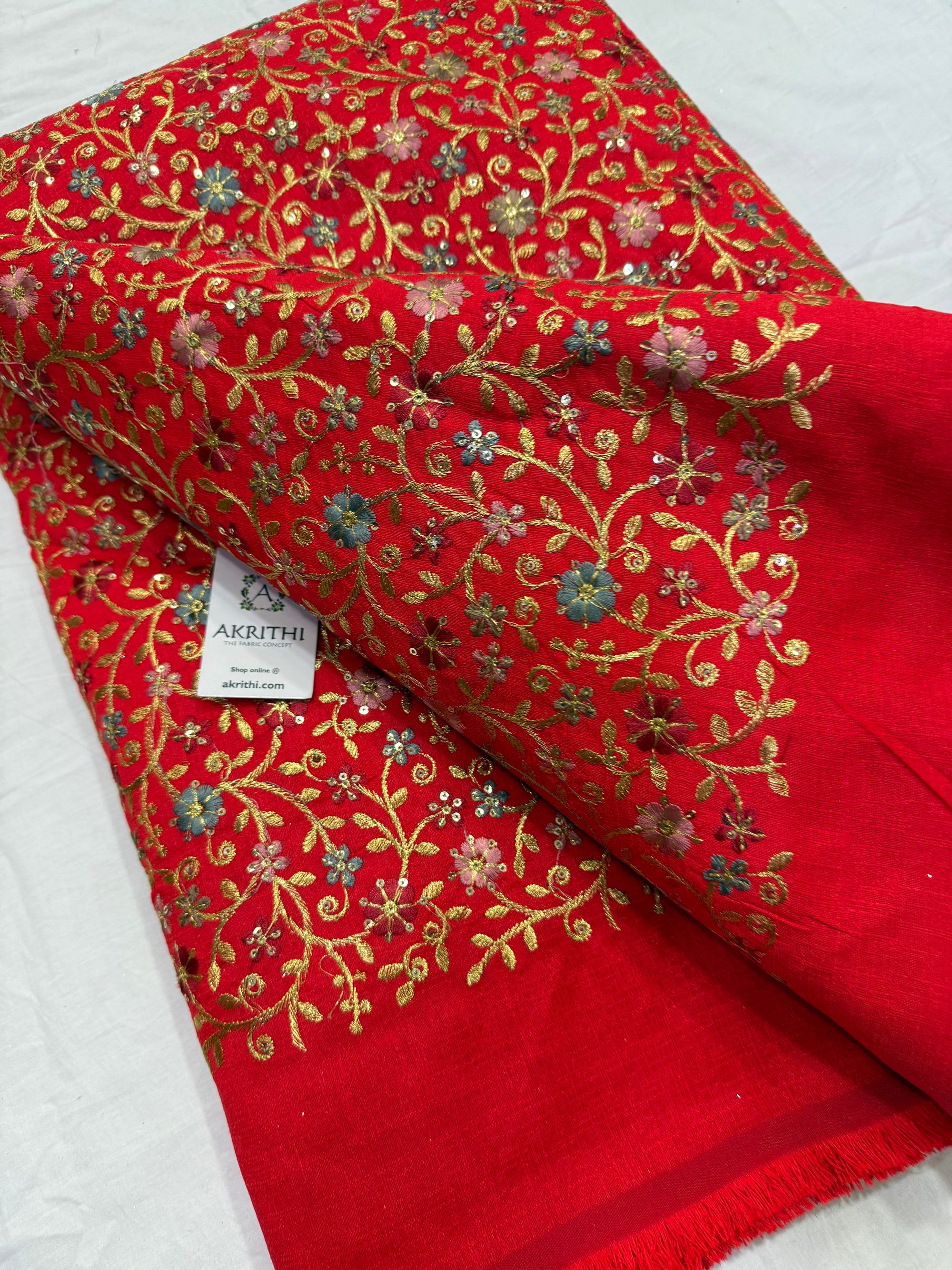 Embroidered raw silk fabric