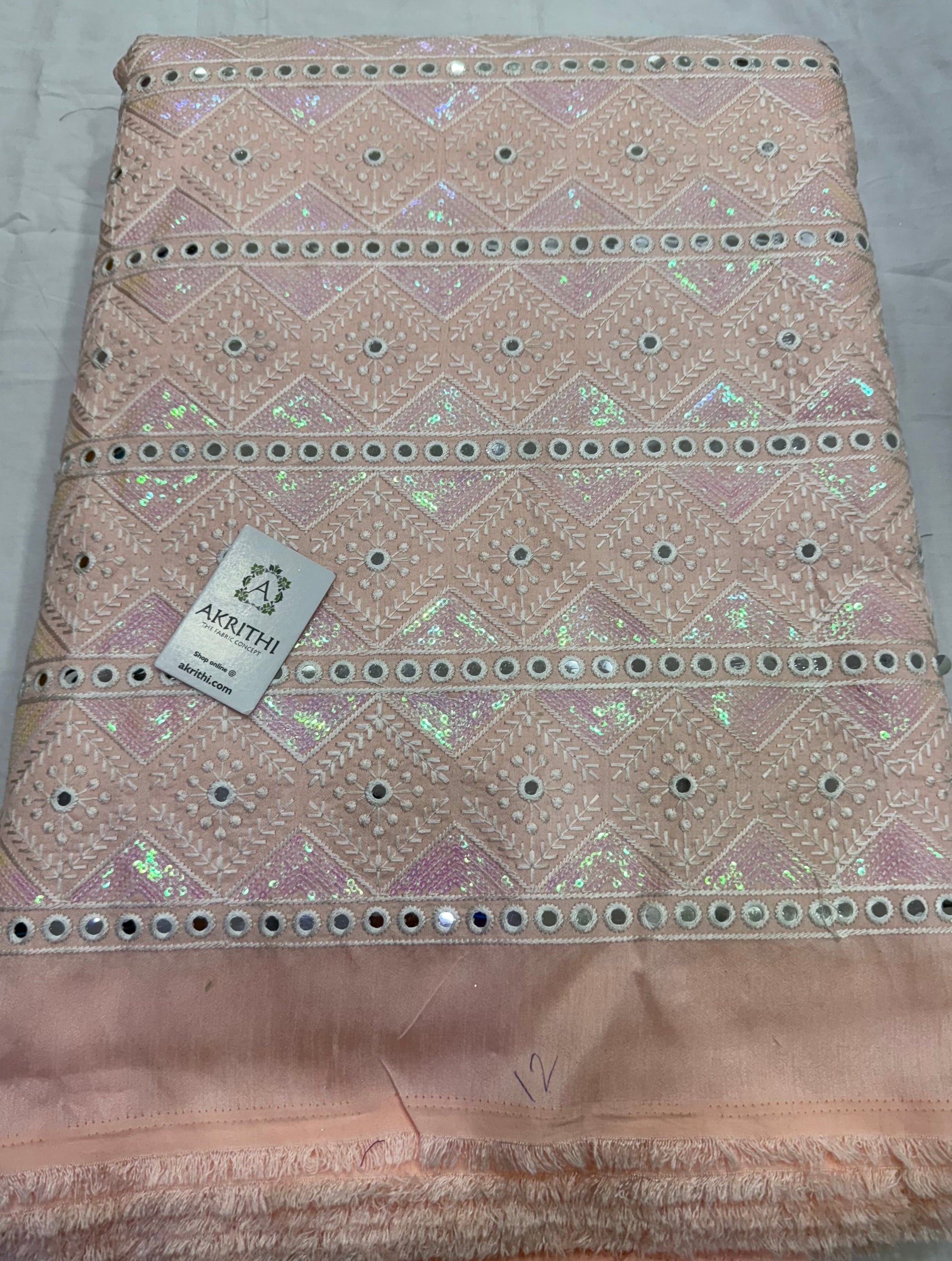 Embroidered raw silk fabric