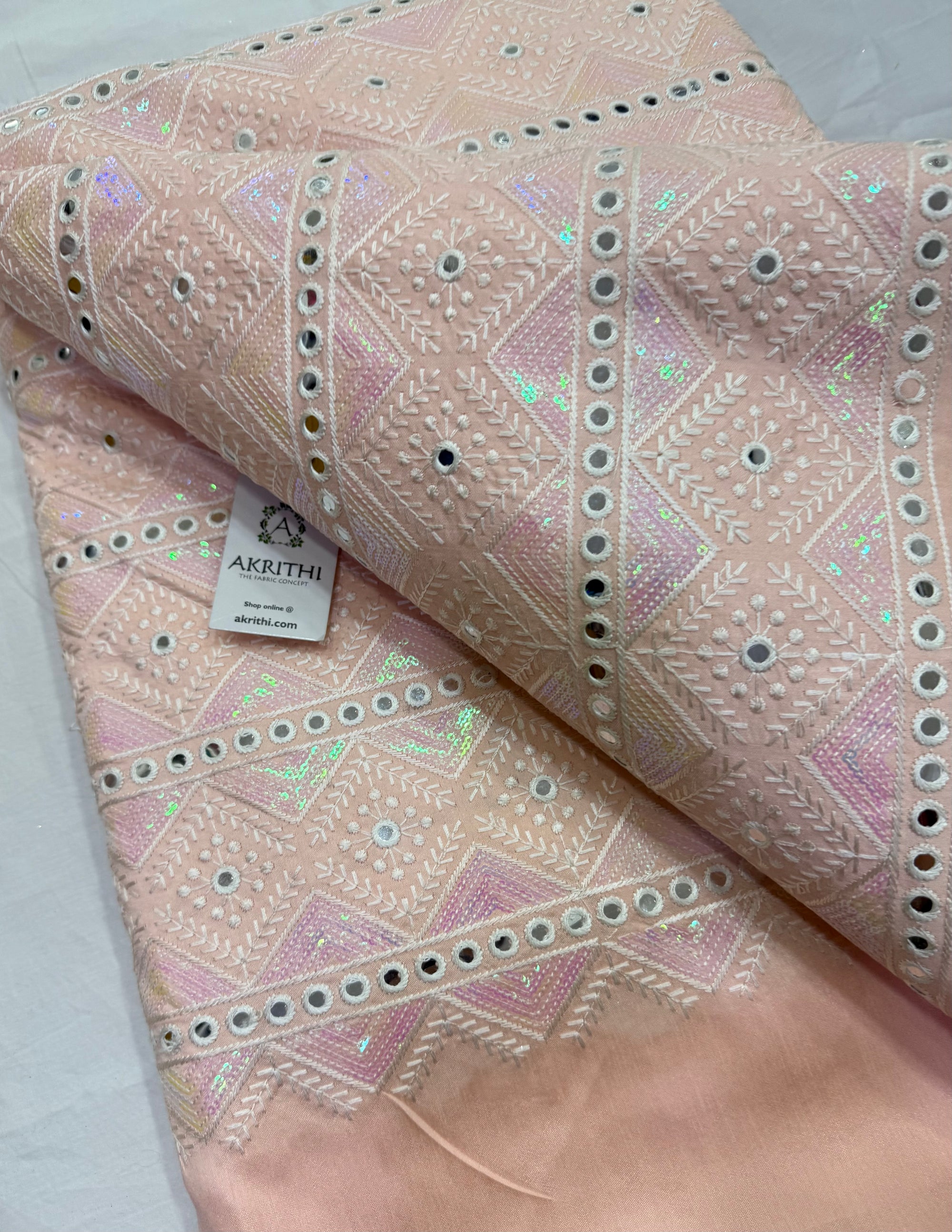 Embroidered raw silk fabric