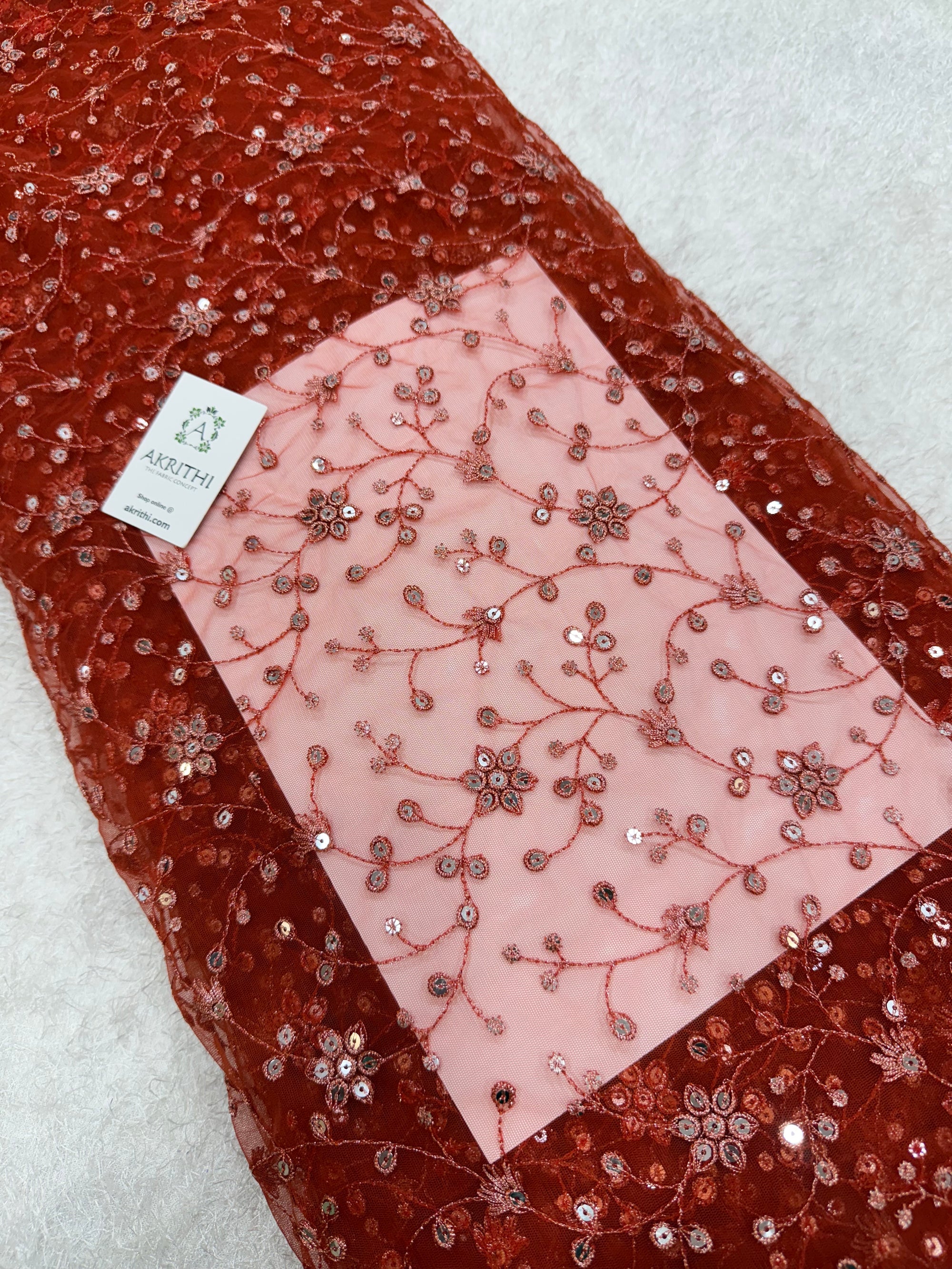 Embroidered net fabric
