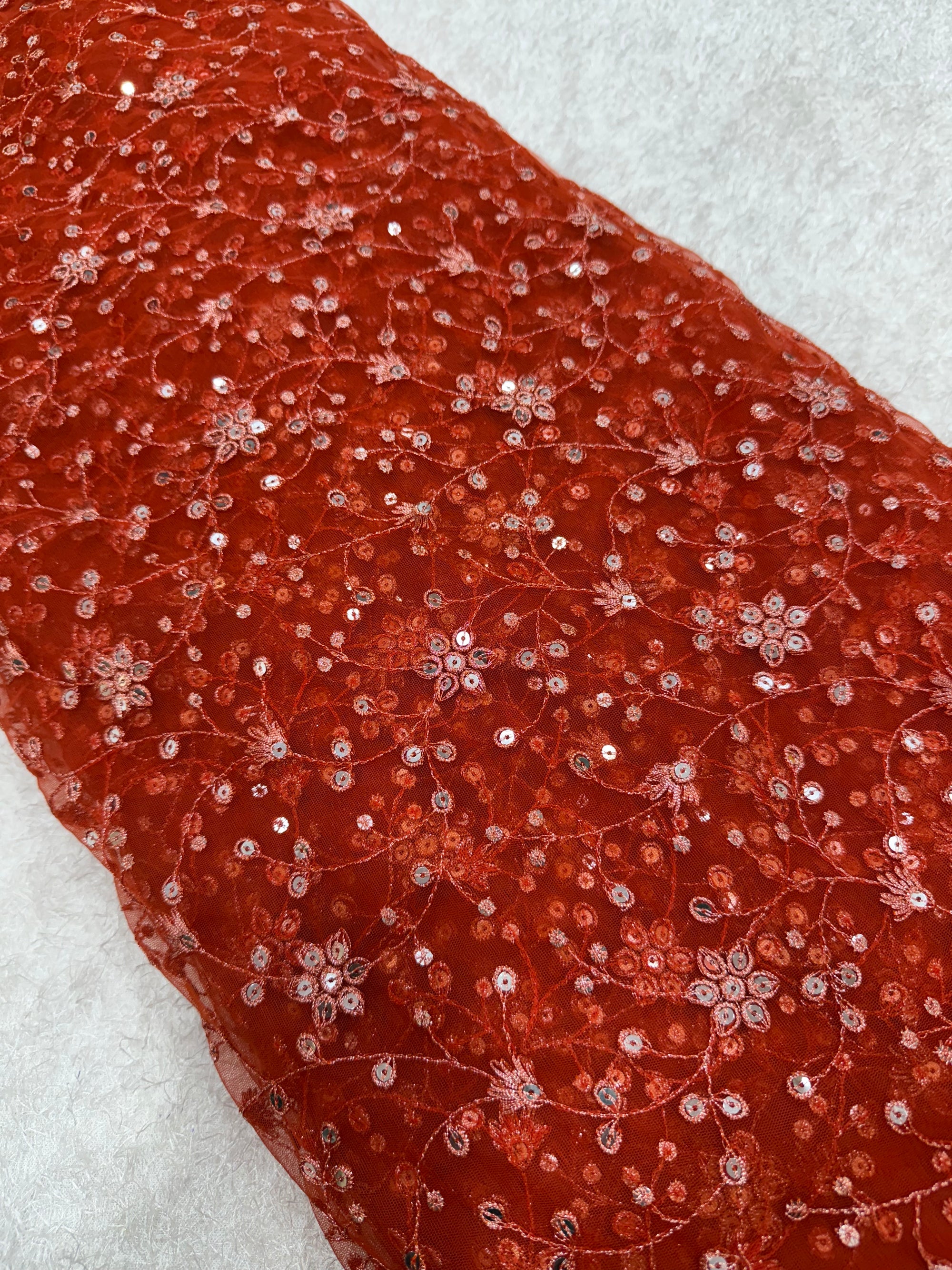 Embroidered net fabric