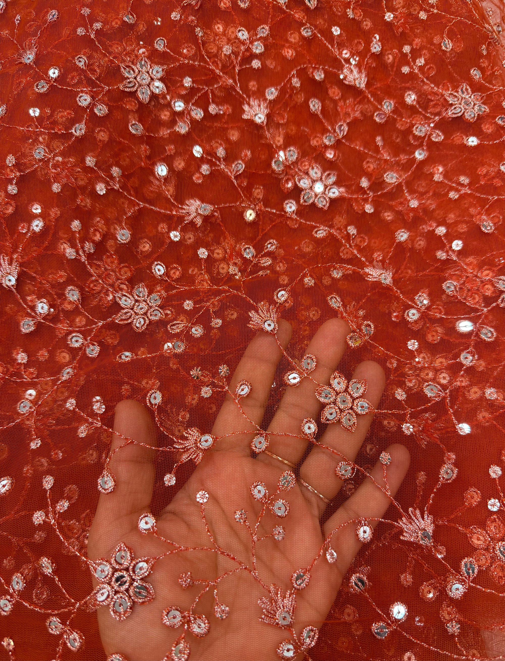Embroidered net fabric