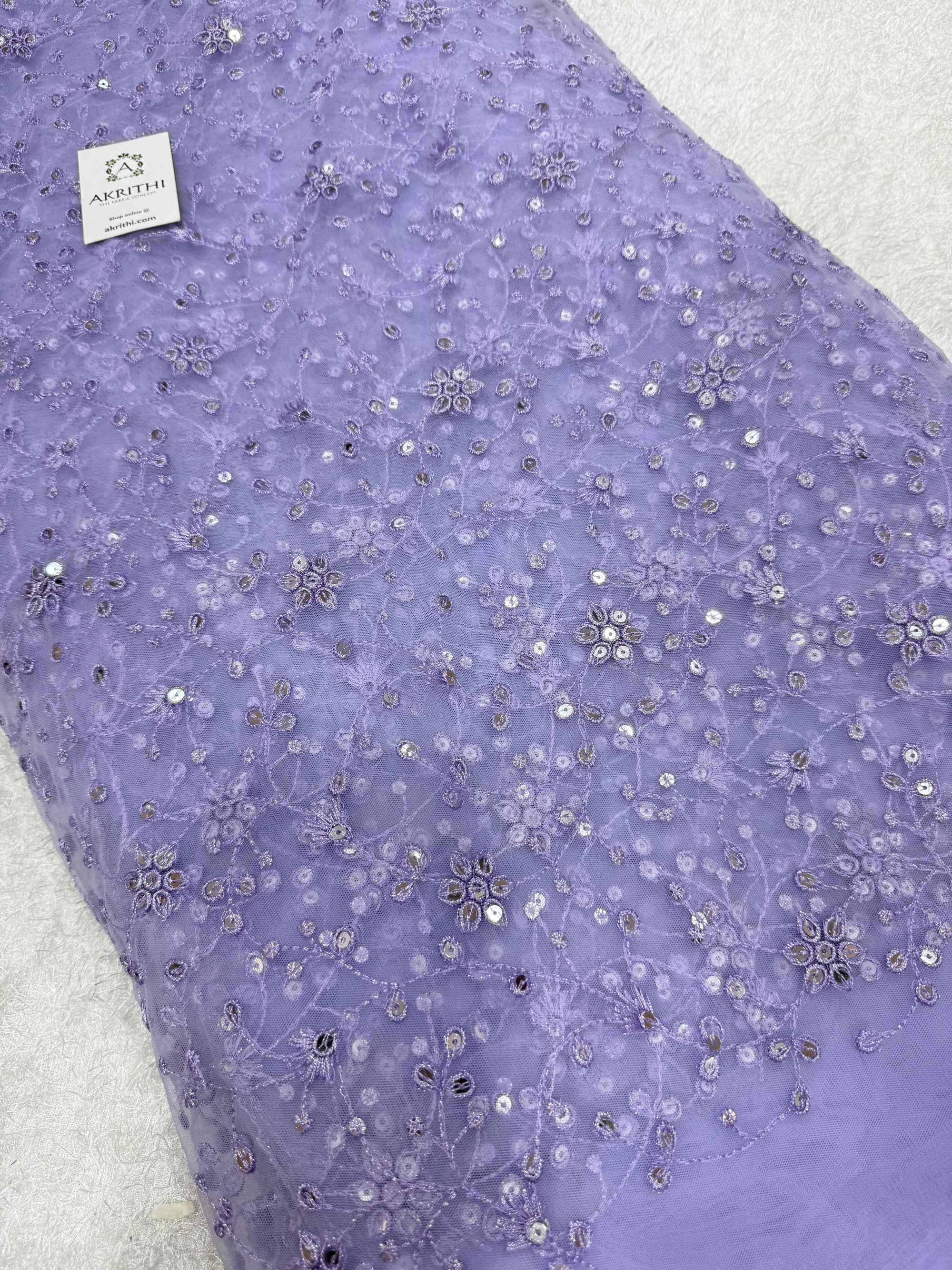 Embroidered net fabric