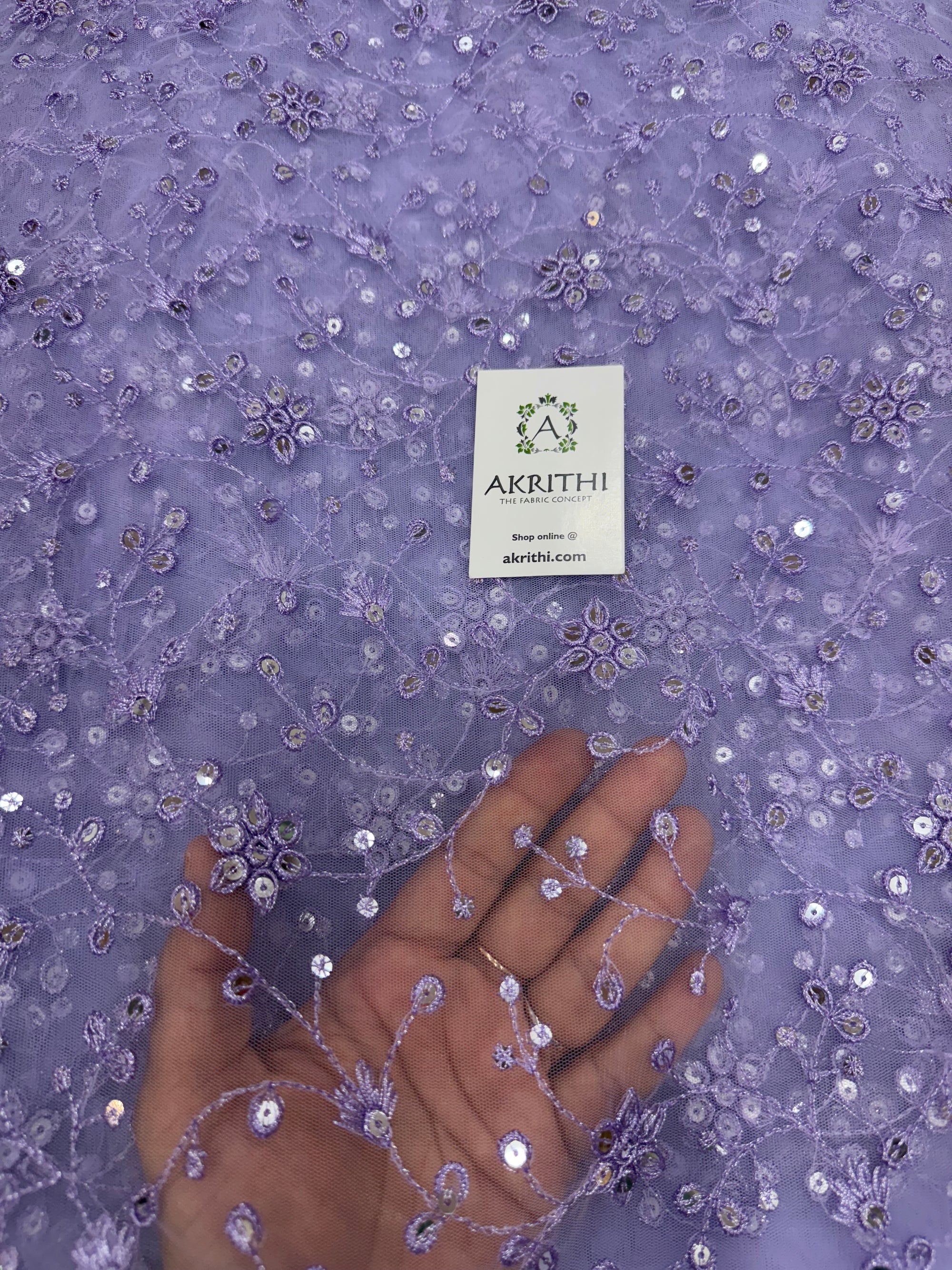 Embroidered net fabric