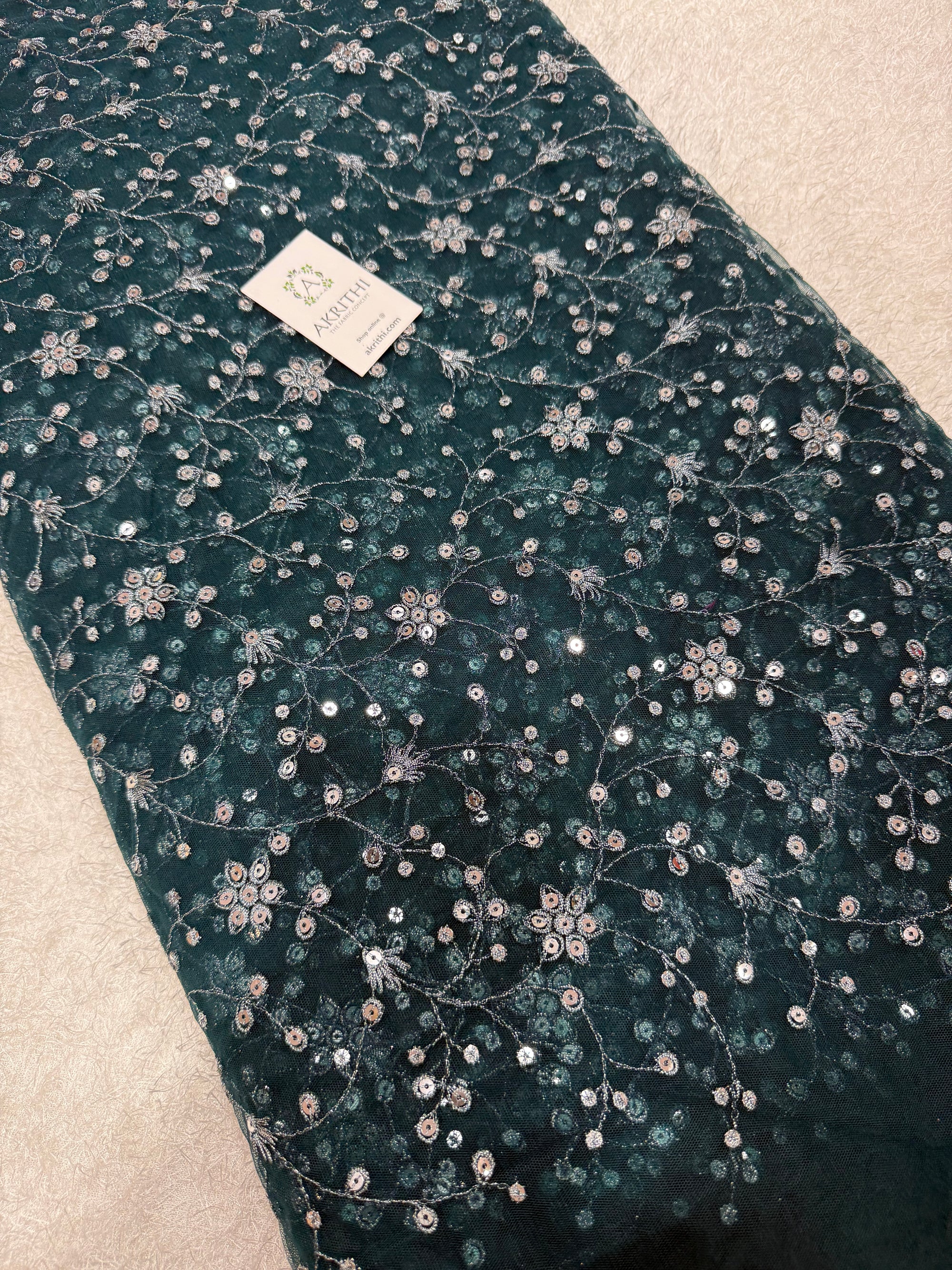 Embroidered net fabric