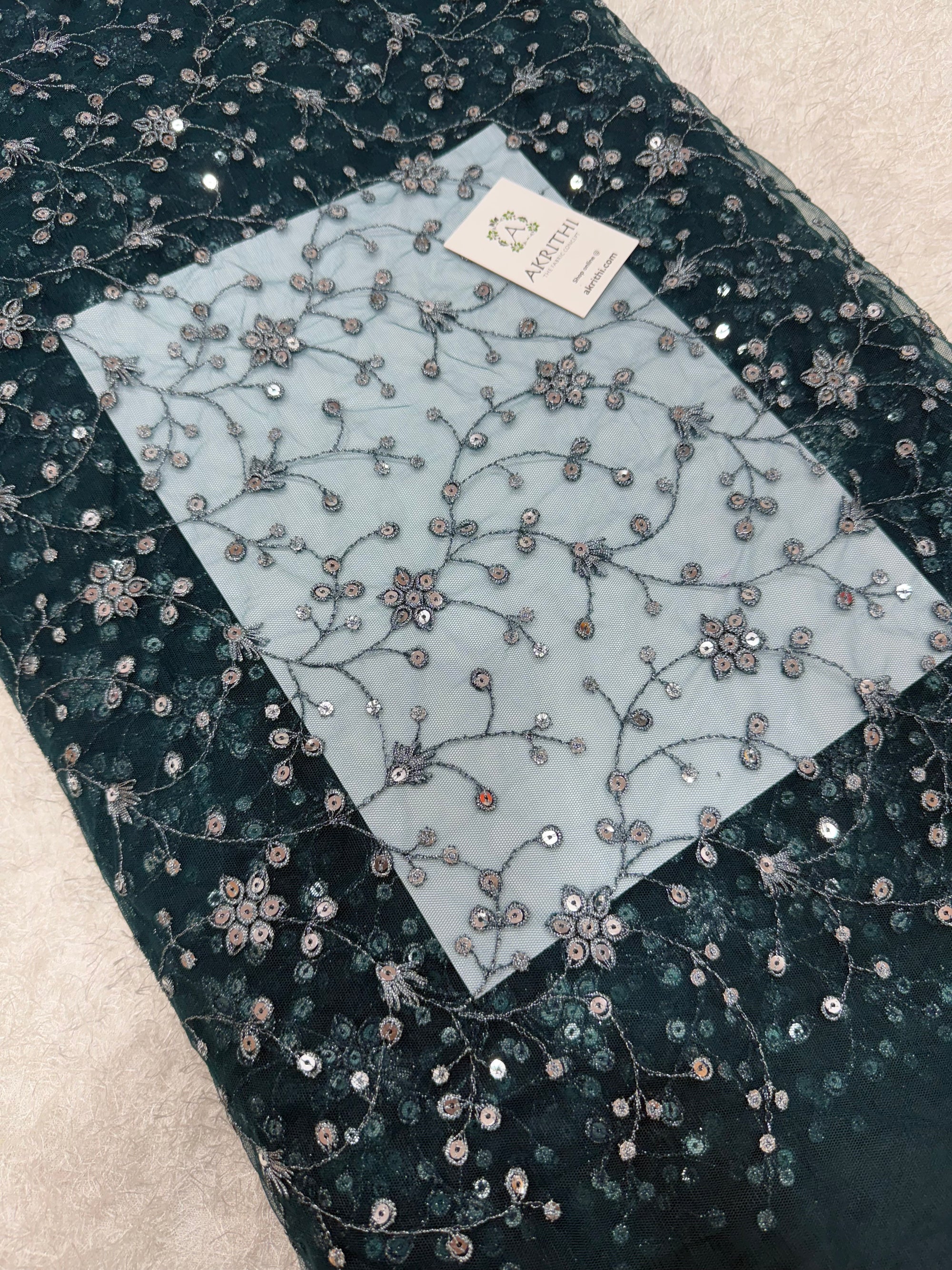 Embroidered net fabric