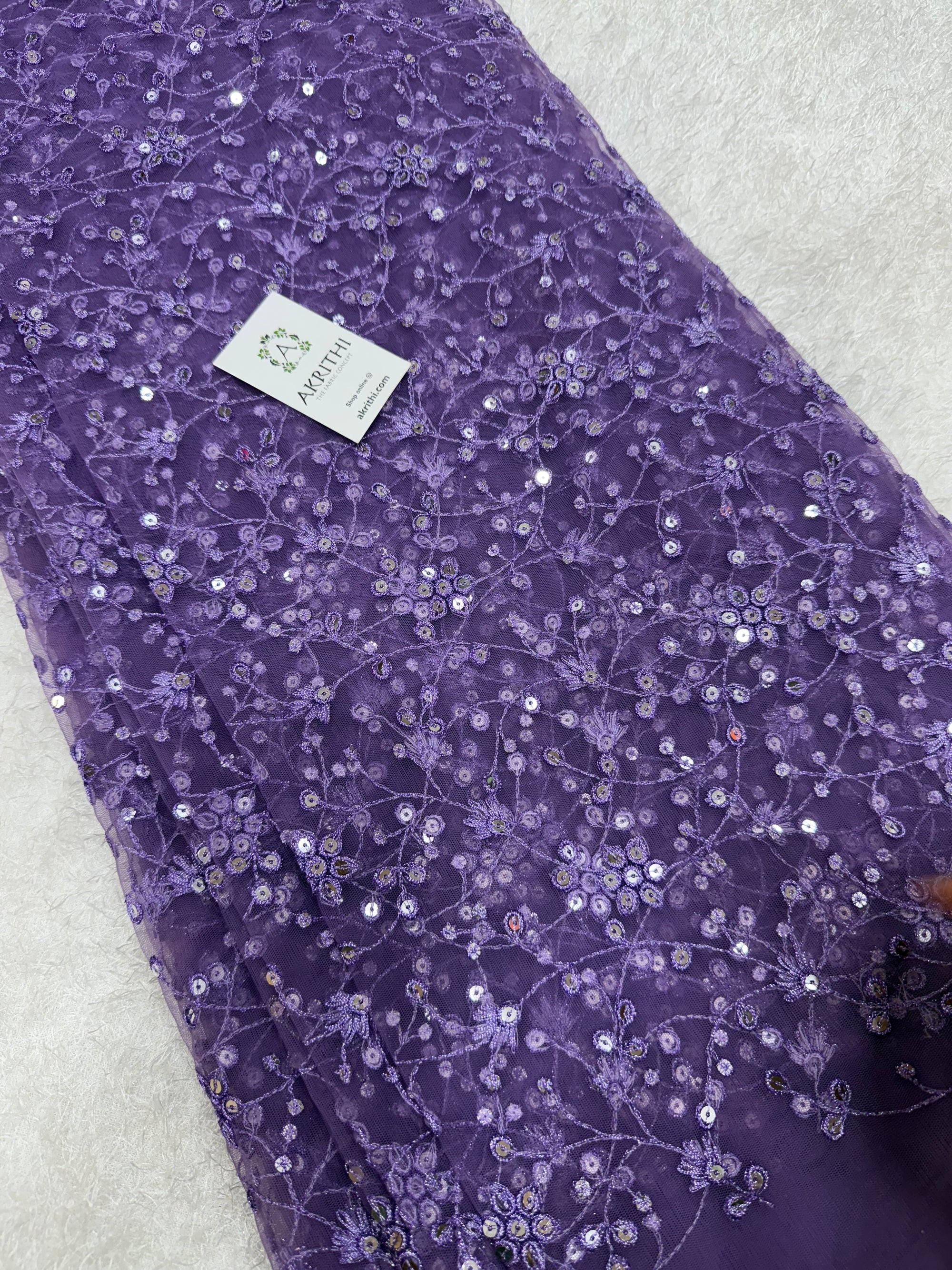 Embroidered net fabric