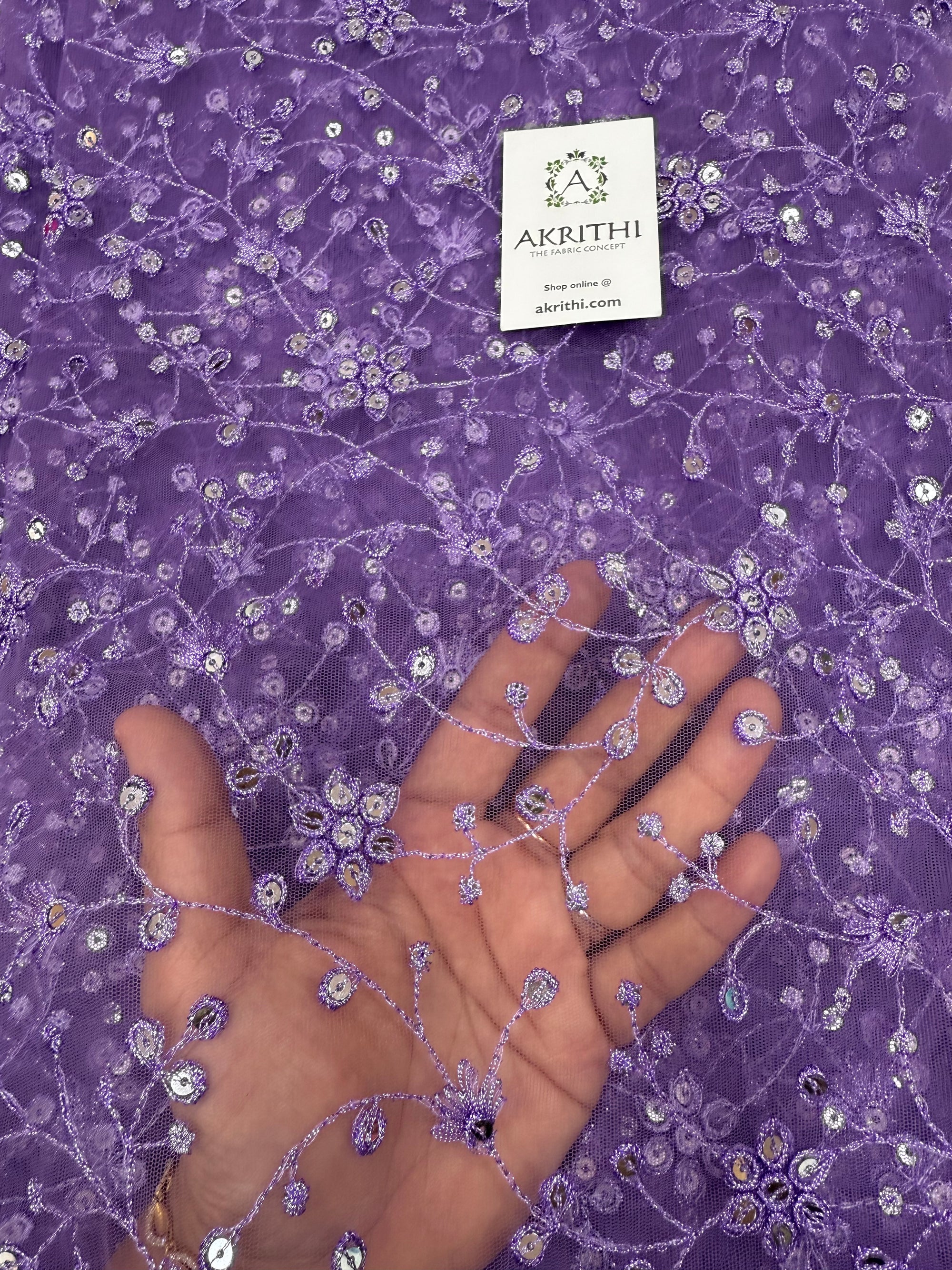 Embroidered net fabric