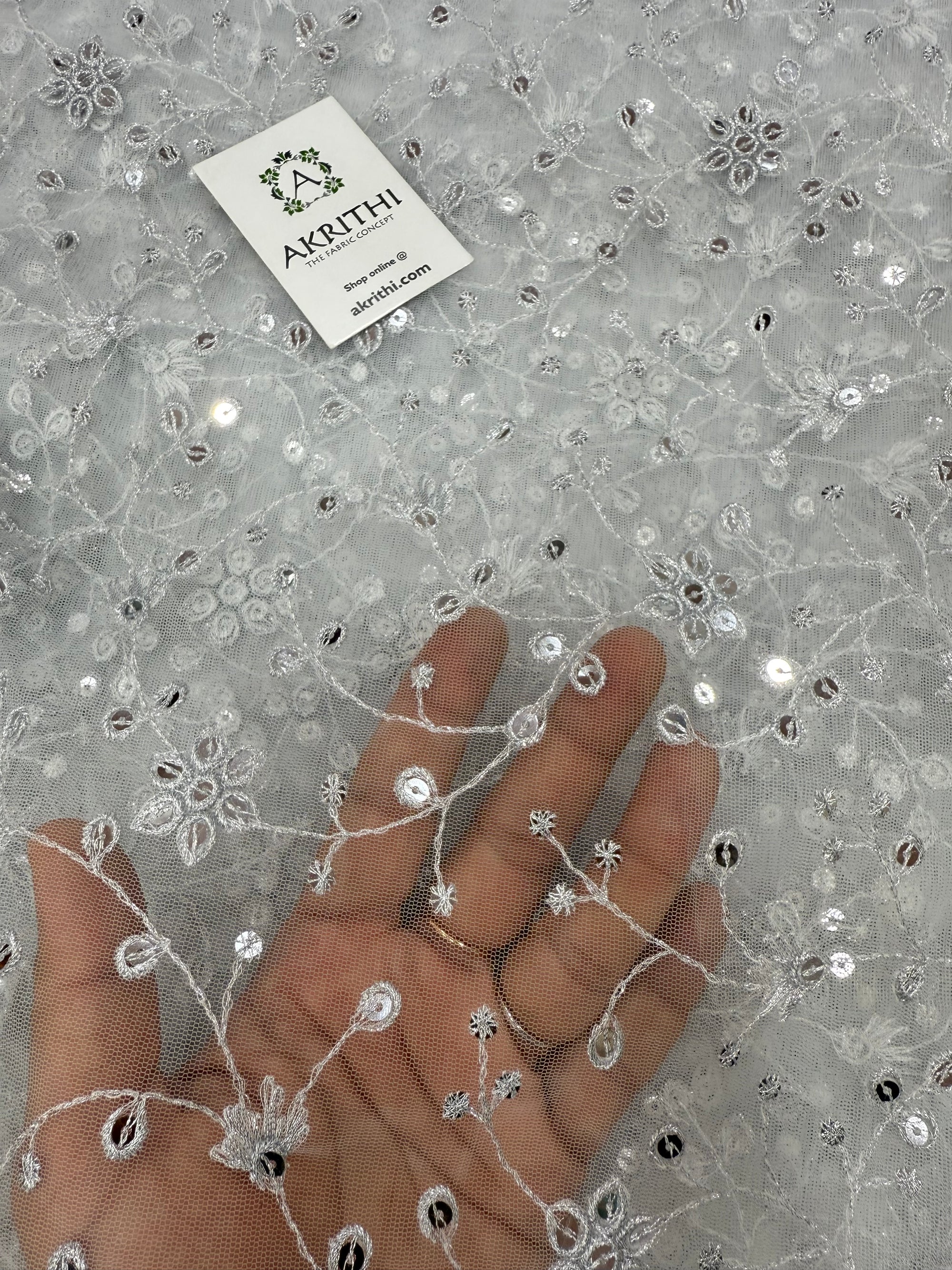 Embroidered net fabric