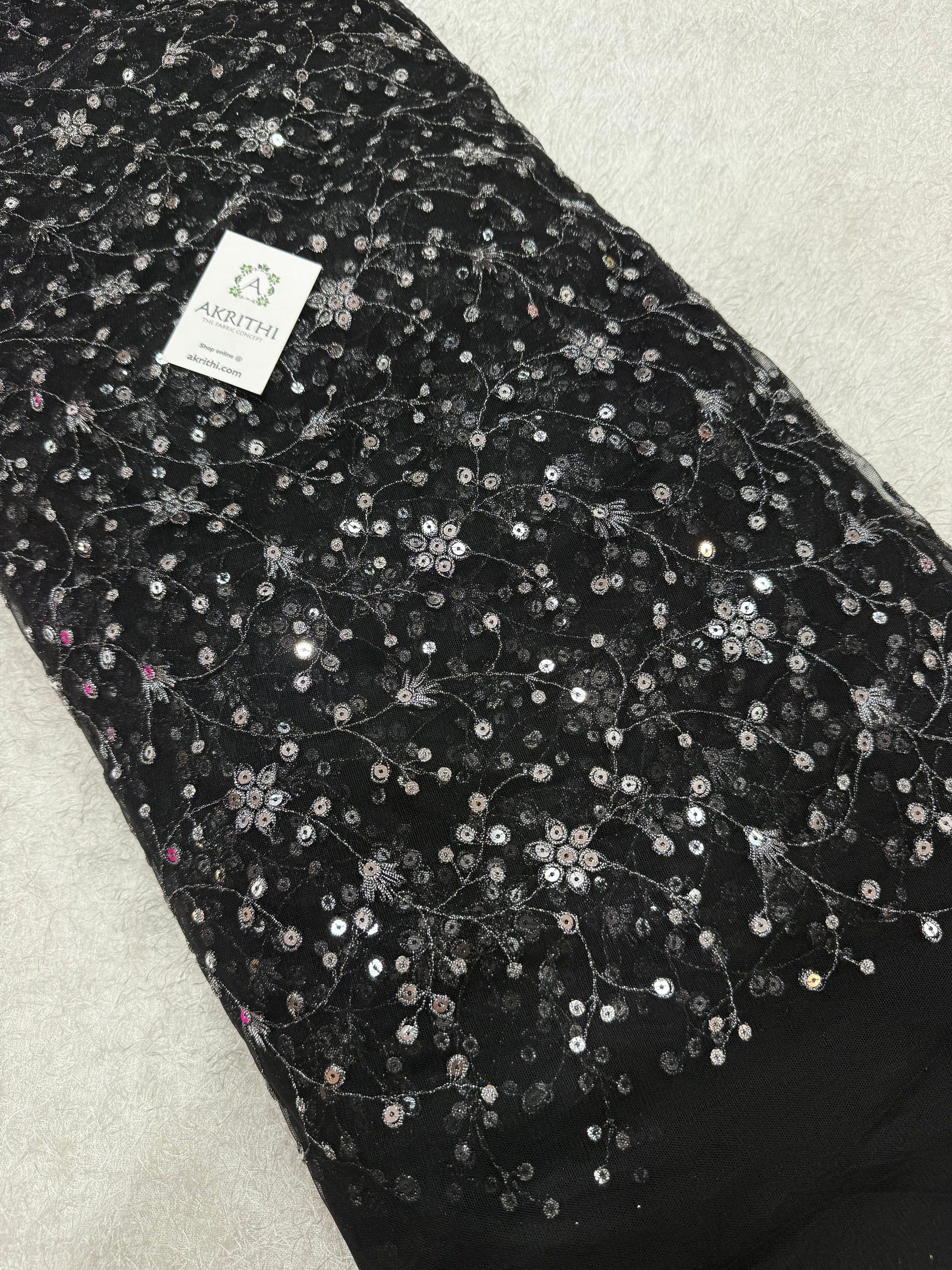 Embroidered net fabric