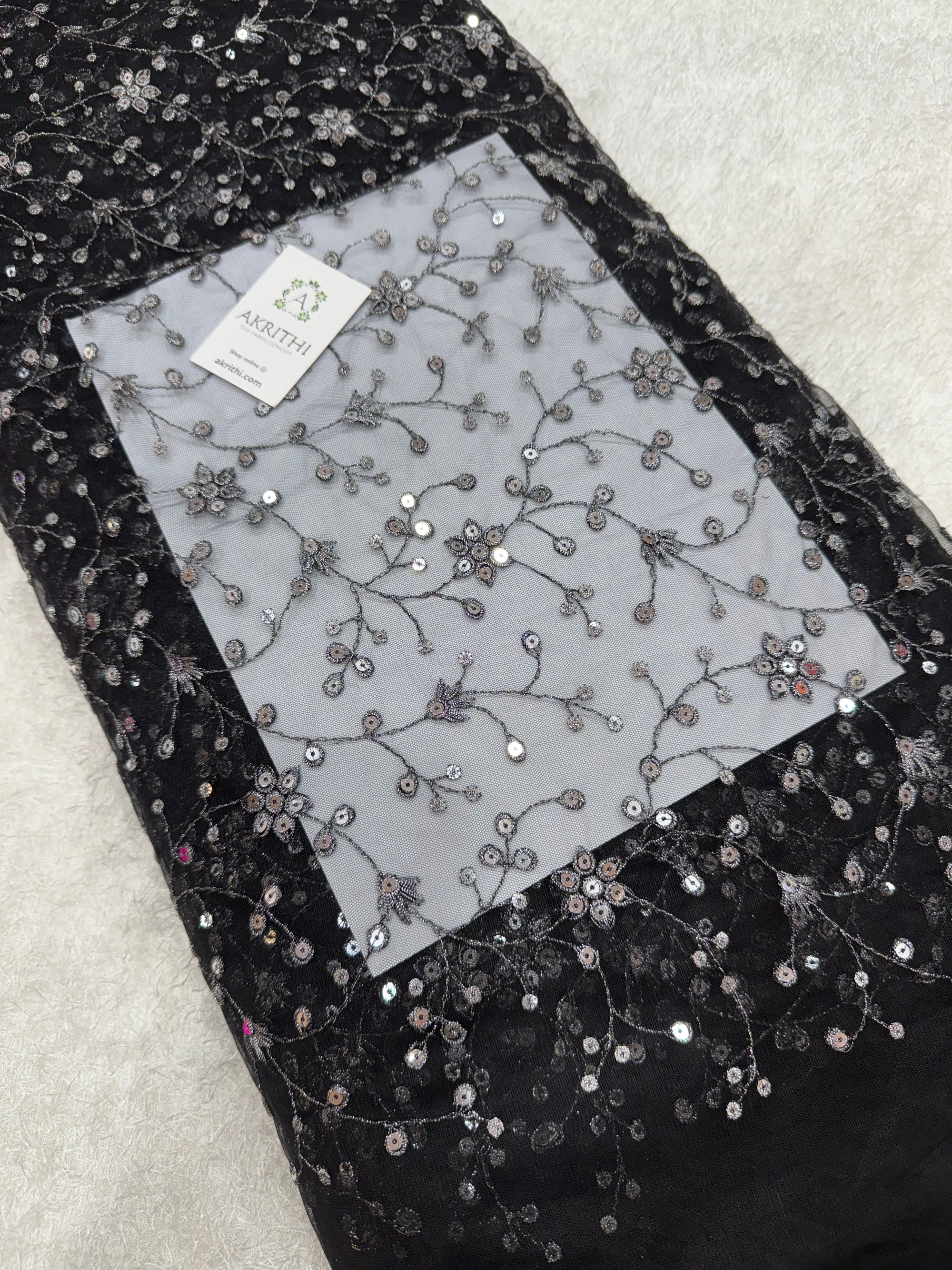 Embroidered net fabric