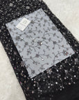 Embroidered net fabric