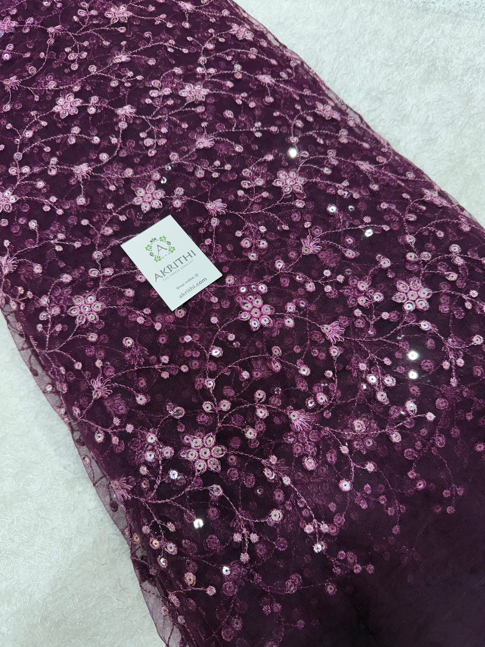 Embroidered net fabric
