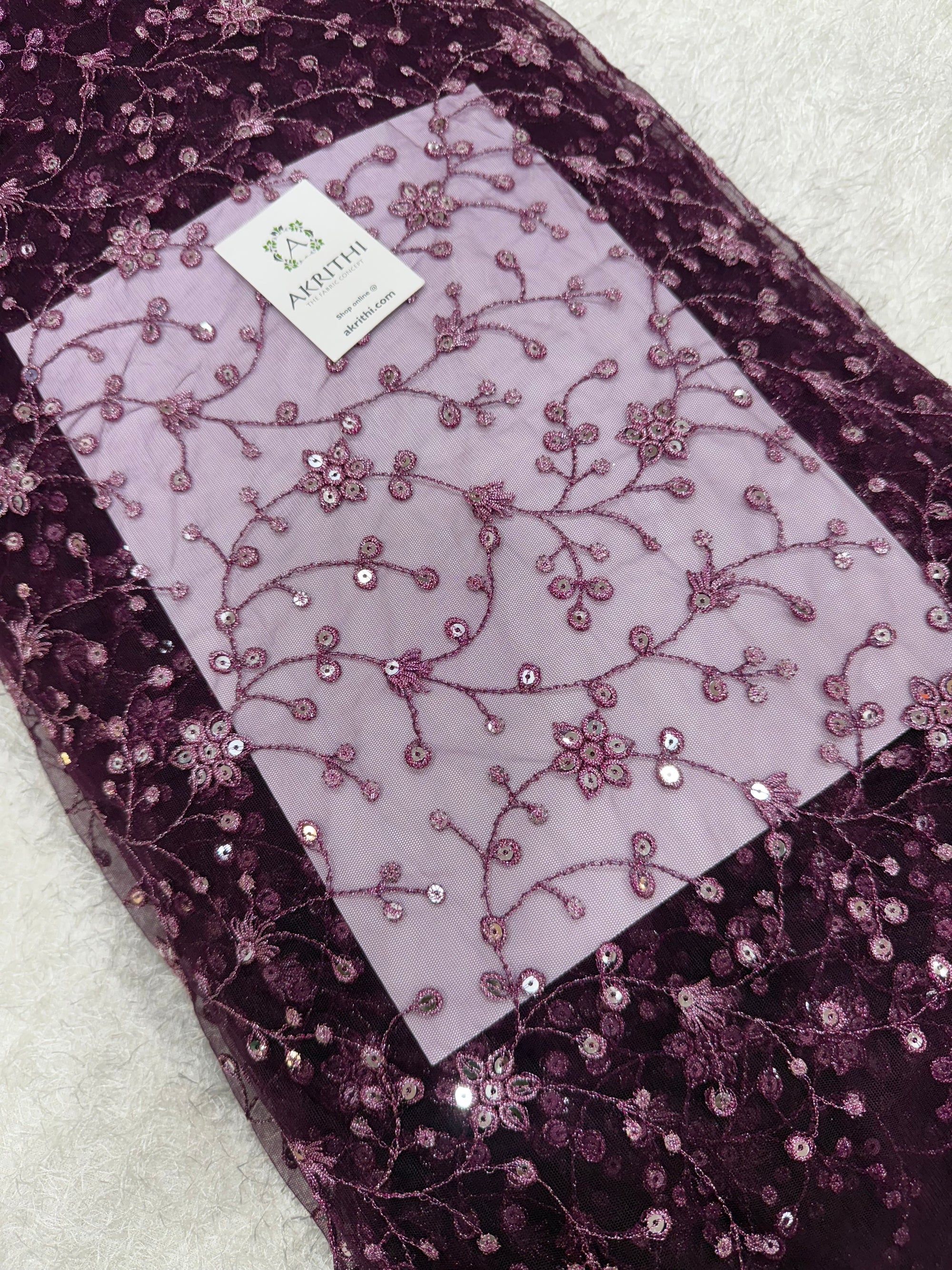 Embroidered net fabric