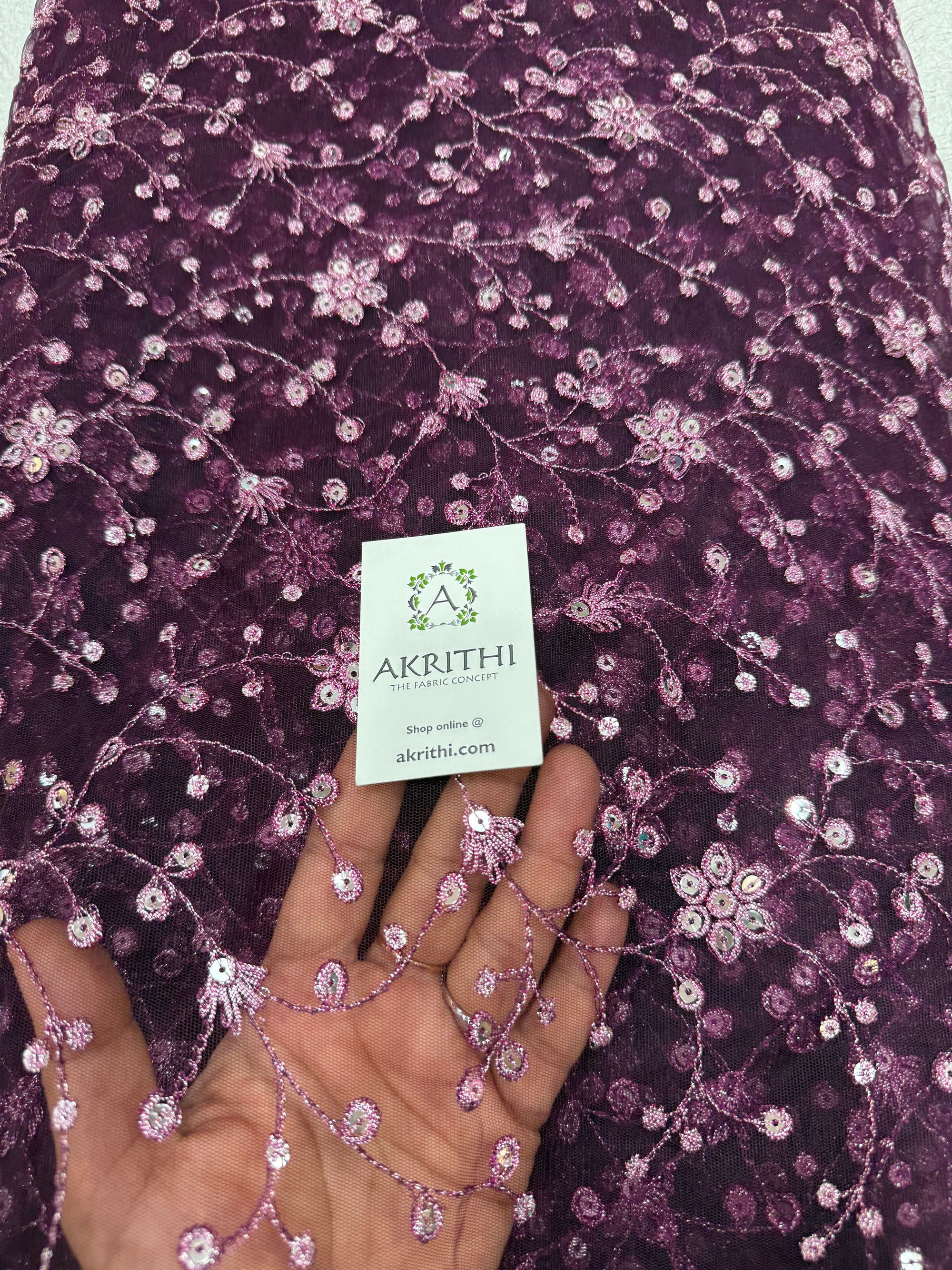 Embroidered net fabric