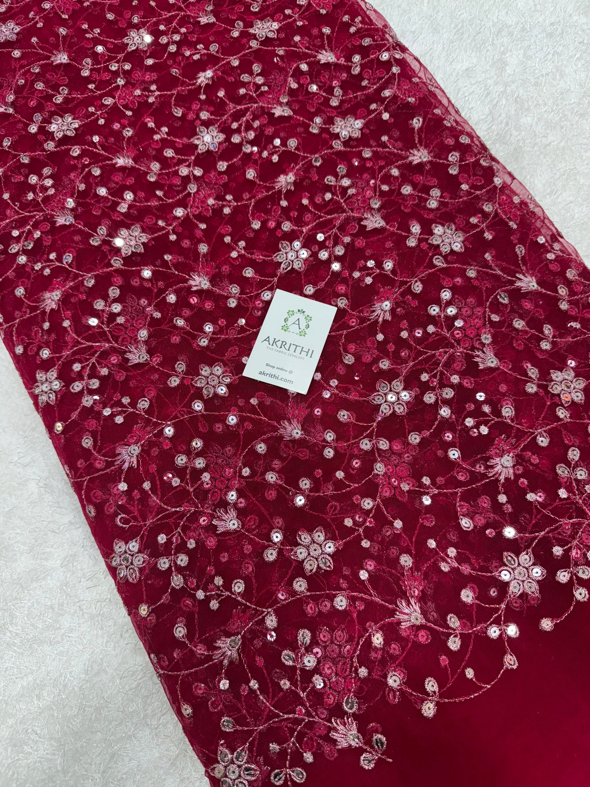 Embroidered net fabric