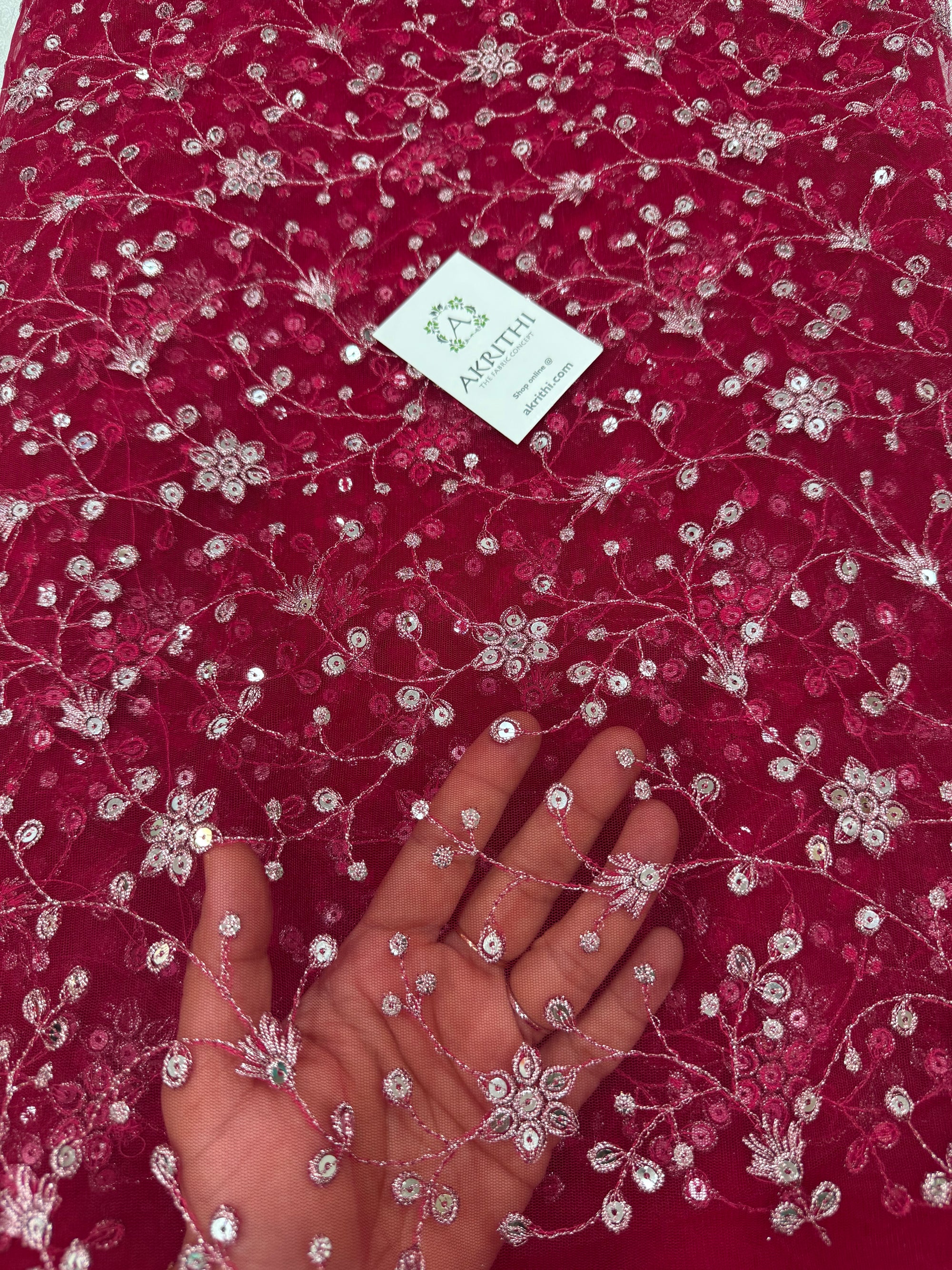 Embroidered net fabric