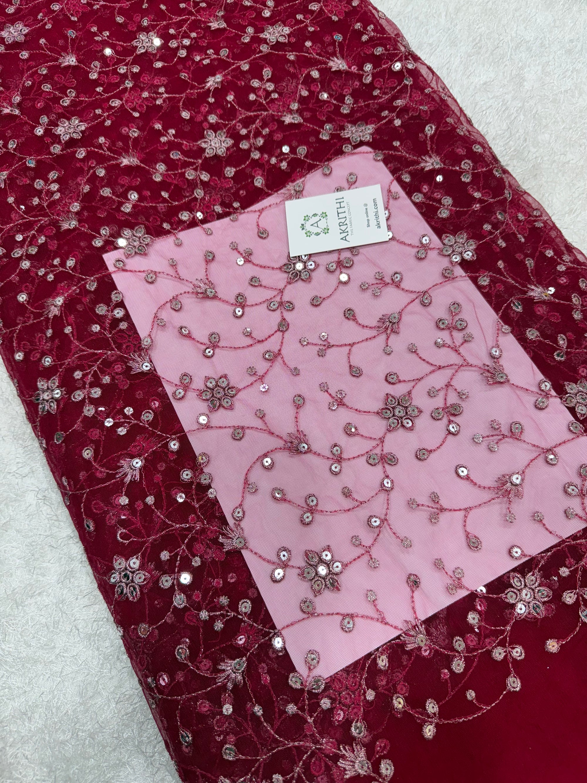 Embroidered net fabric